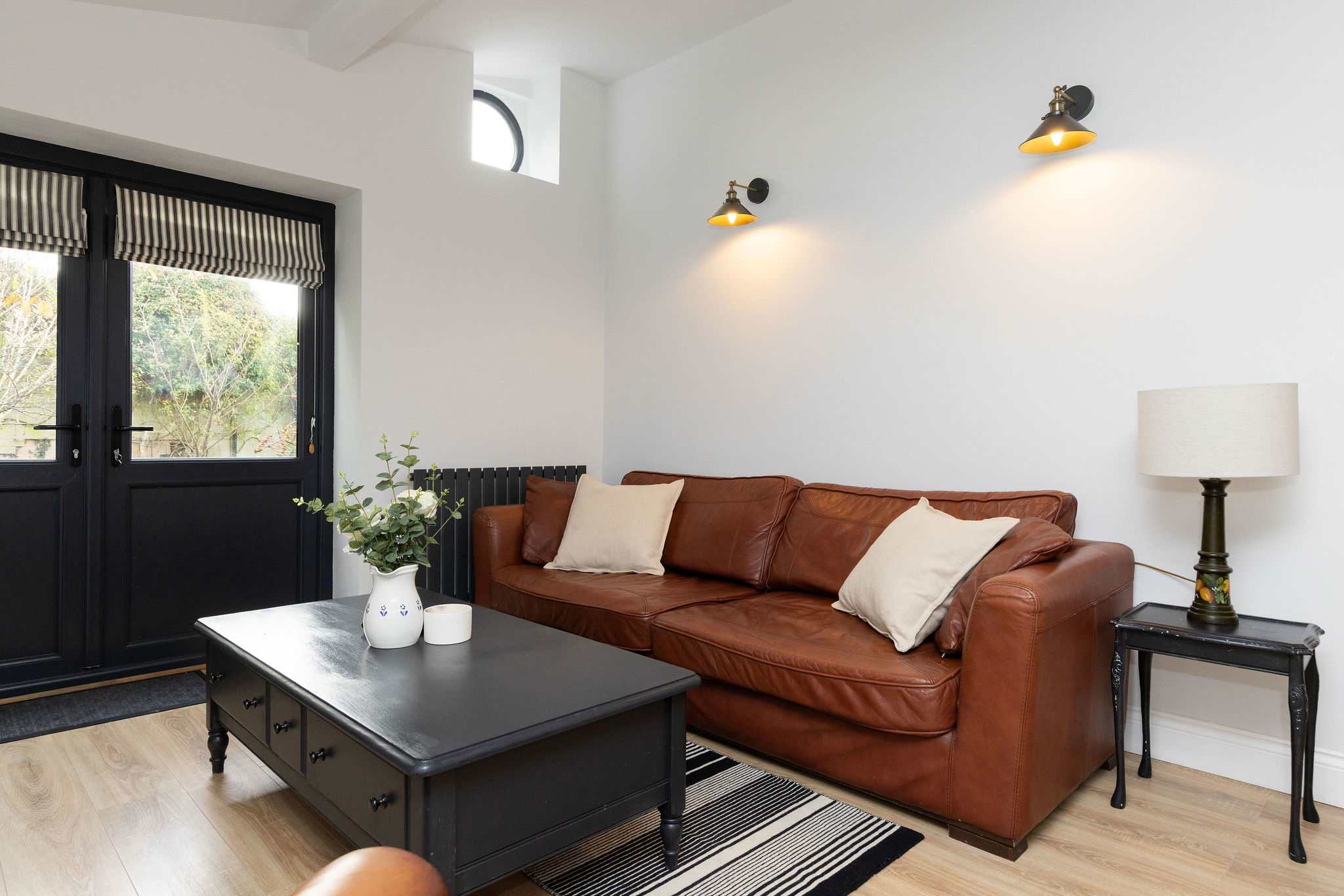 3 seater leather sofa to relax on after a day out exploring!