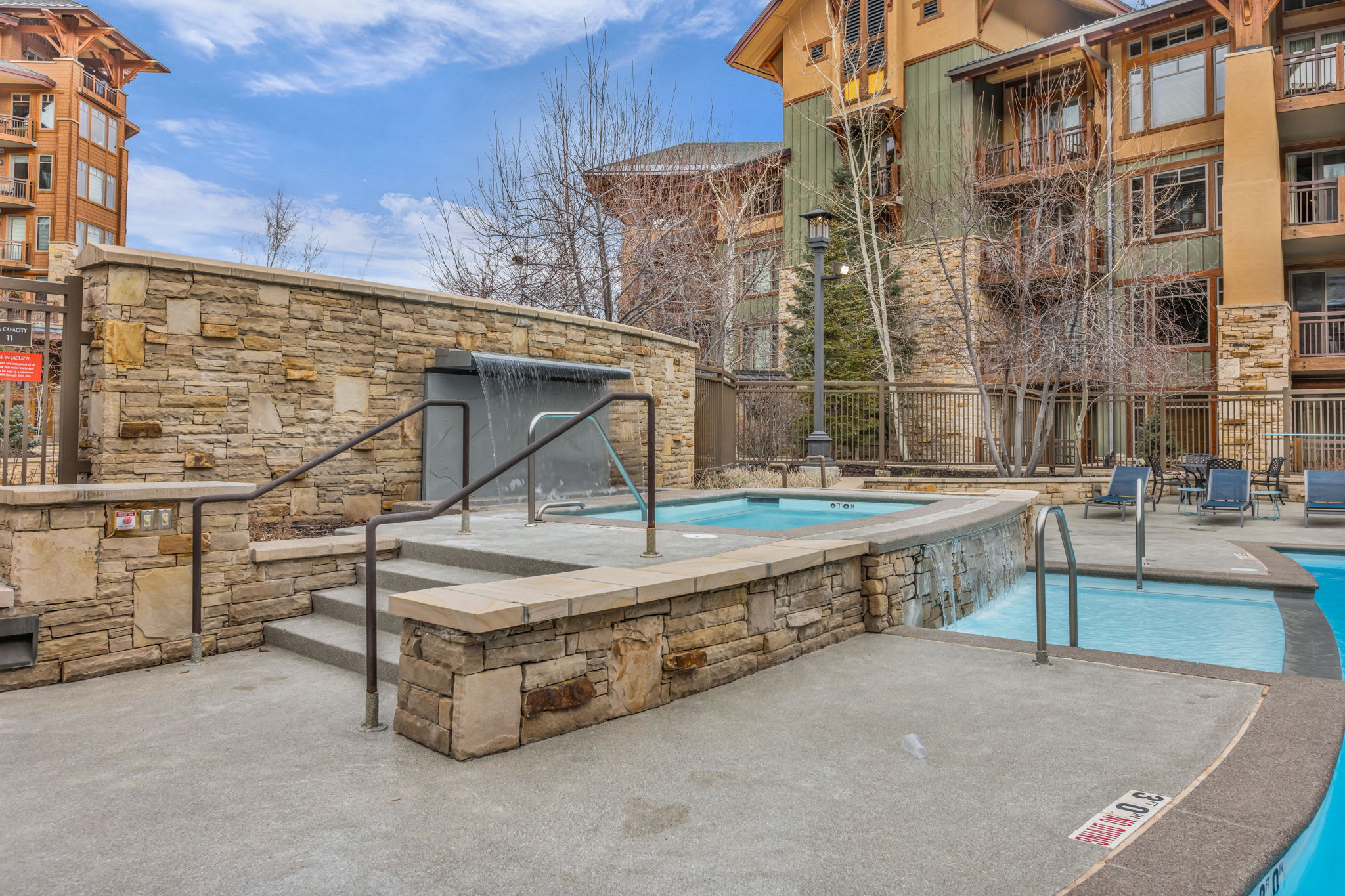 Bask in bubbling bliss or make a splash at the community spa & pool​