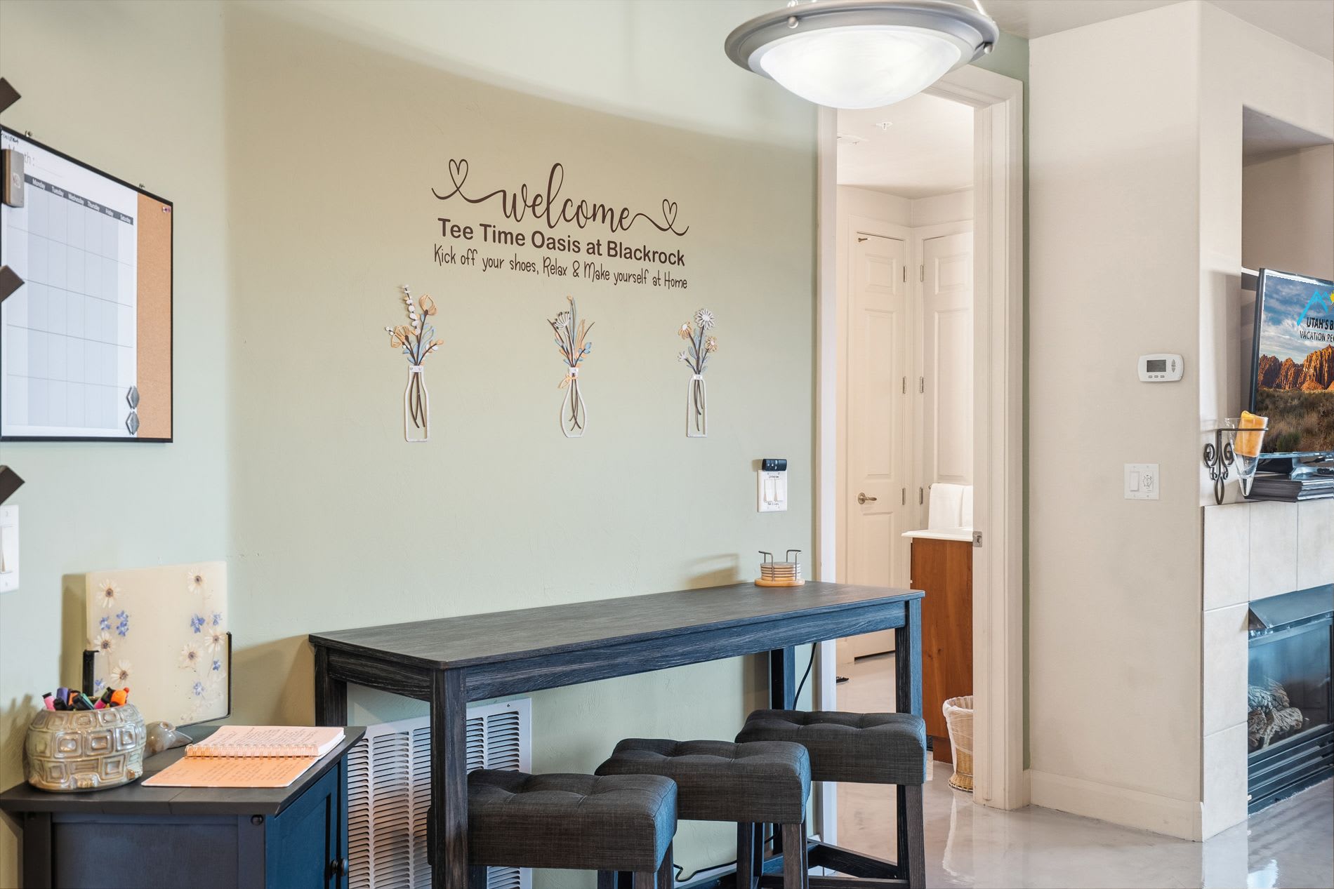 Bar seating next to the kitchen