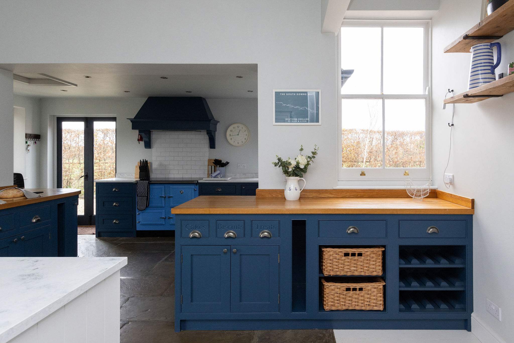 Bespoke blue kitchen with generous workspace