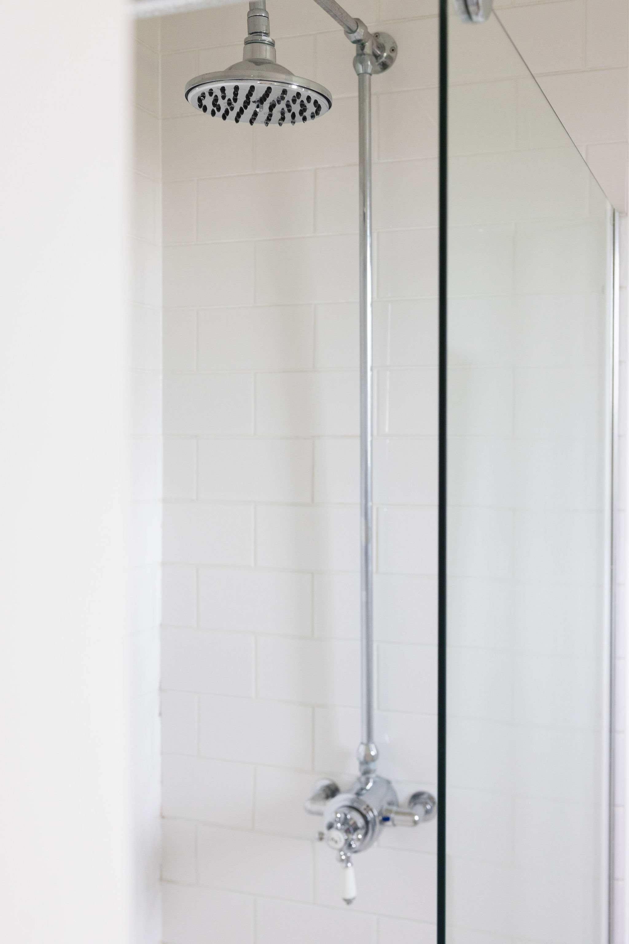 Walk-in shower with rainfall head