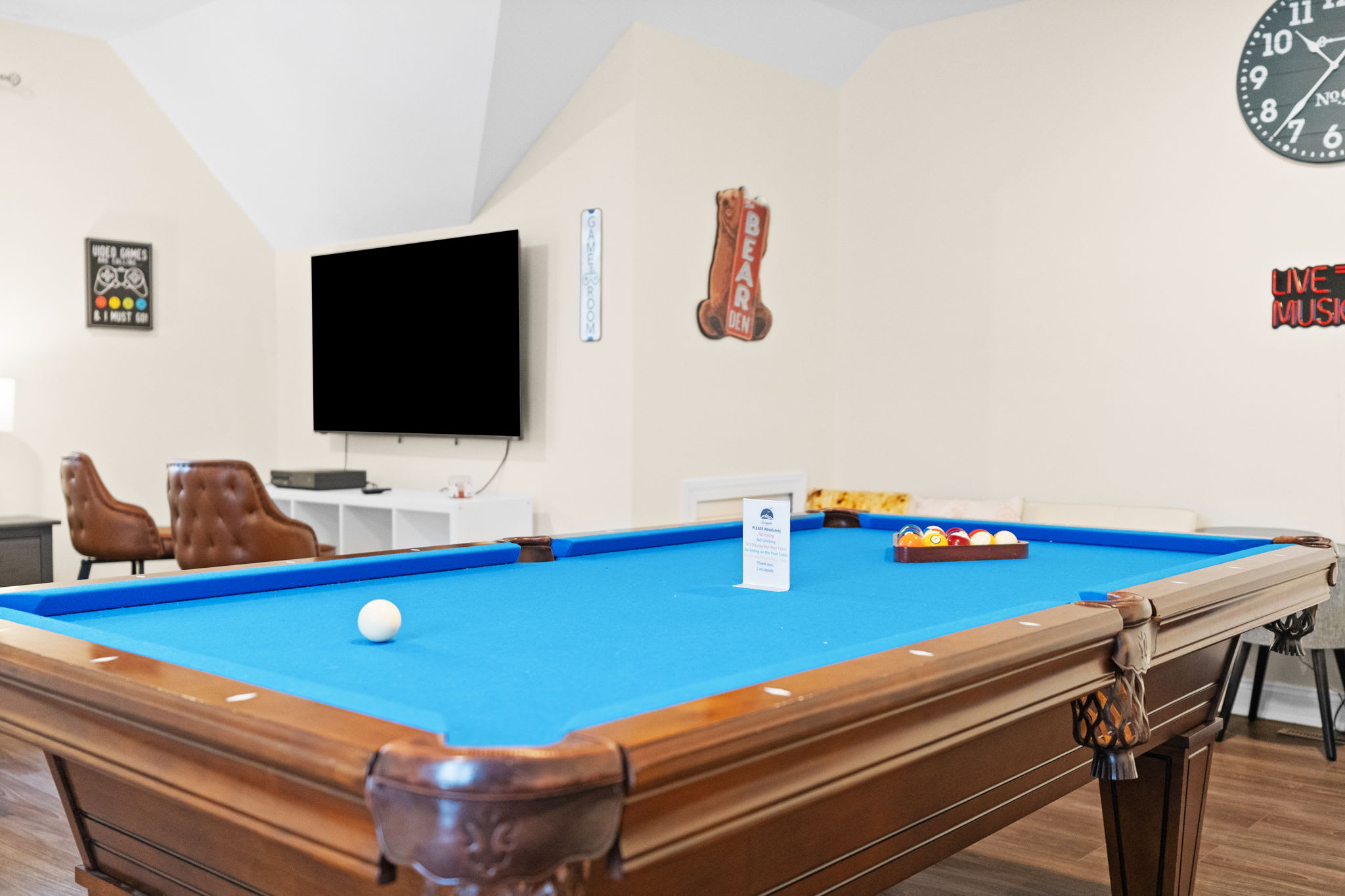 Spacious game room featuring regulation-size pool table - perfect for family entertainment in the Pocono Mountains