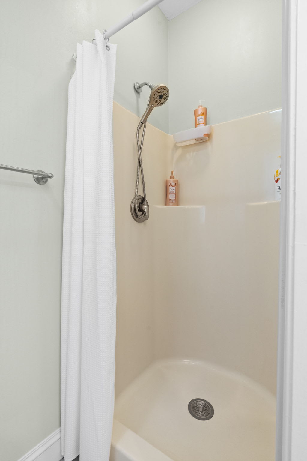 Second bathroom storage with fresh towels and linens provided for your comfort