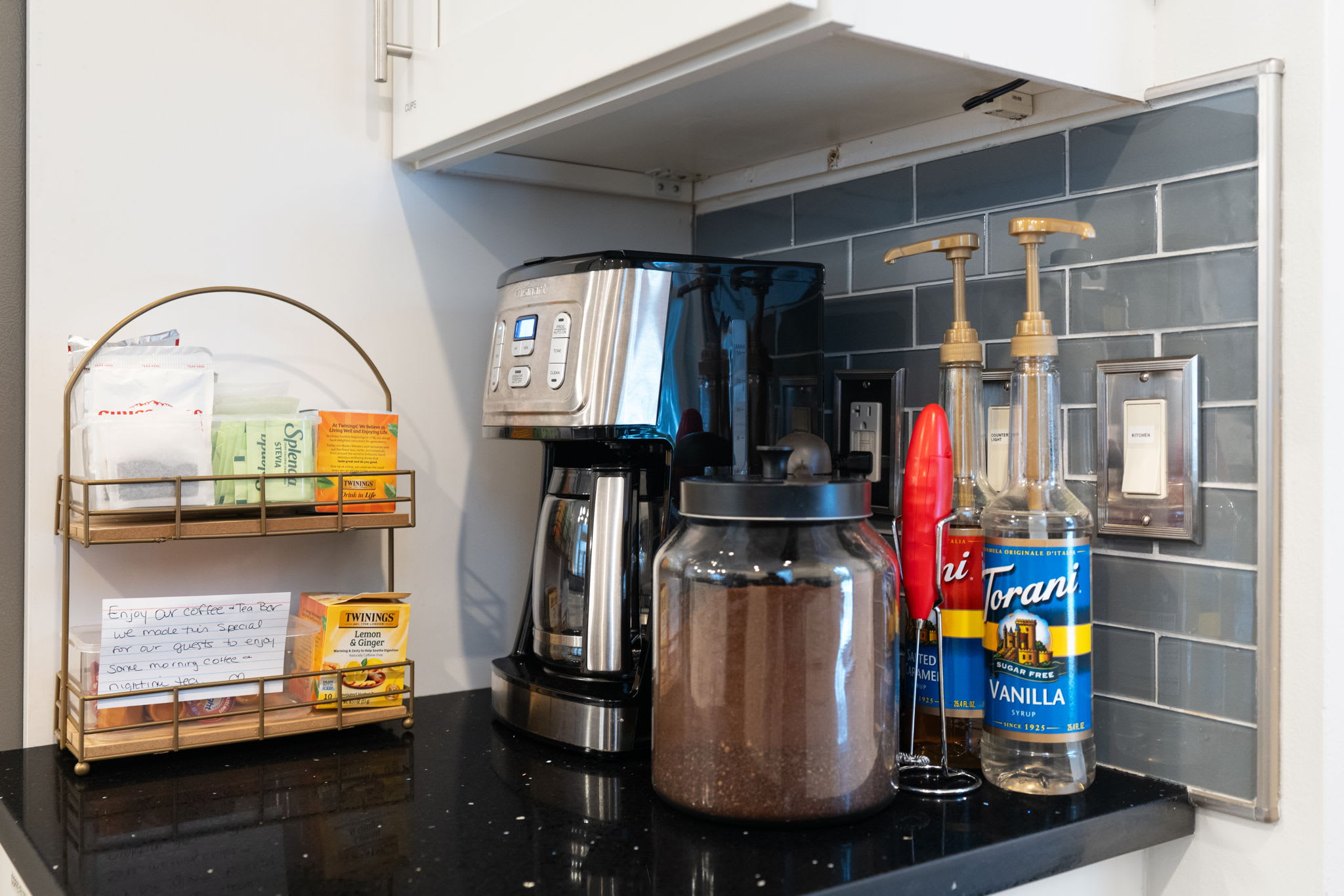 Kitchen bar area with coffee station and essentials - start your Poconos morning right