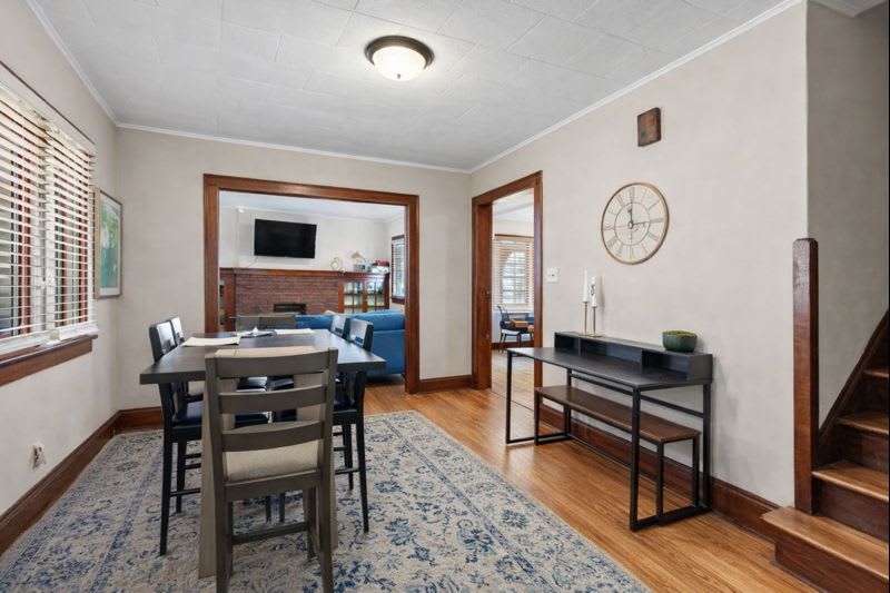 Gather for meals together at the chic dining table, seating 6