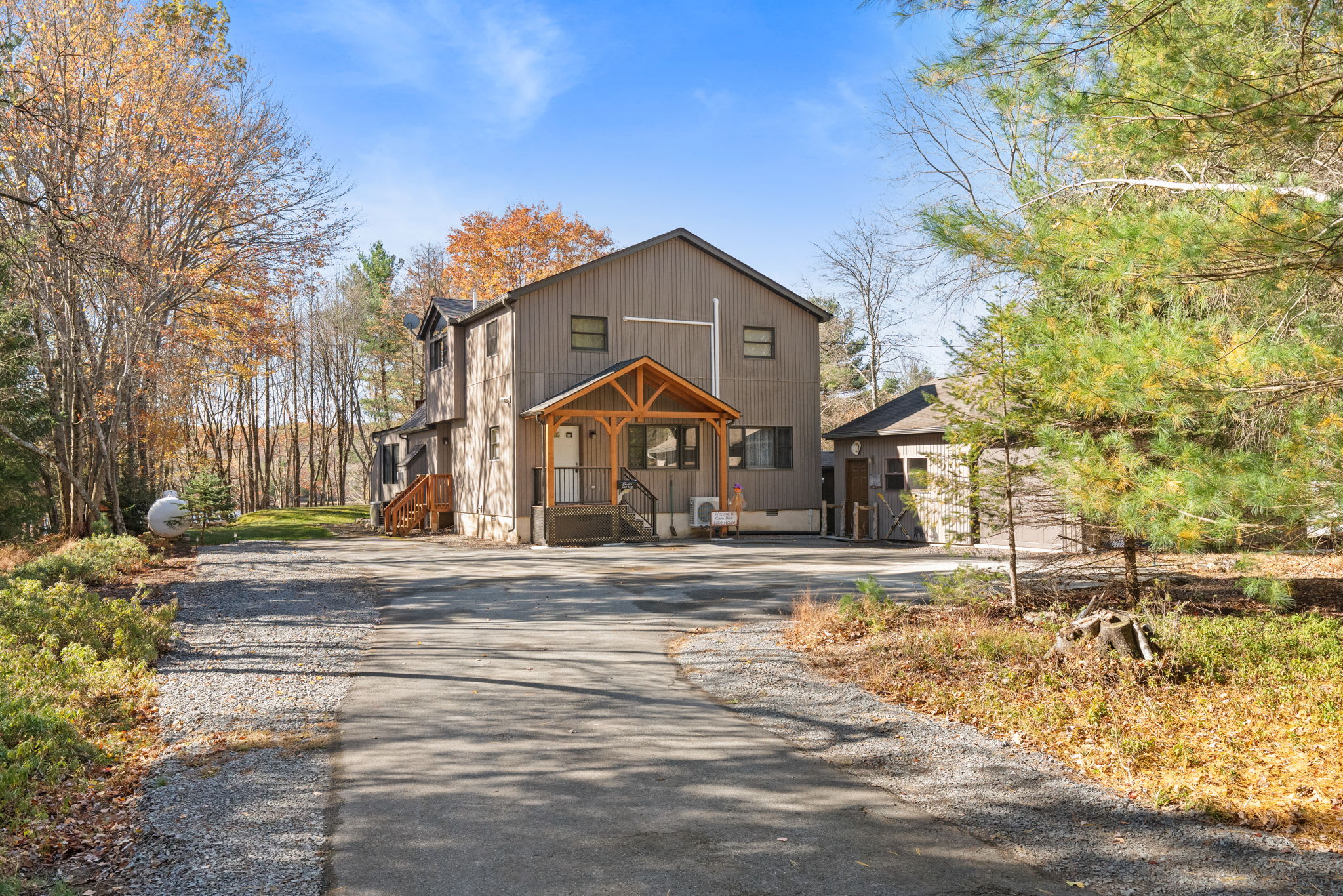 Paved driveway with convenient parking for multiple vehicles - easy access to your vacation home