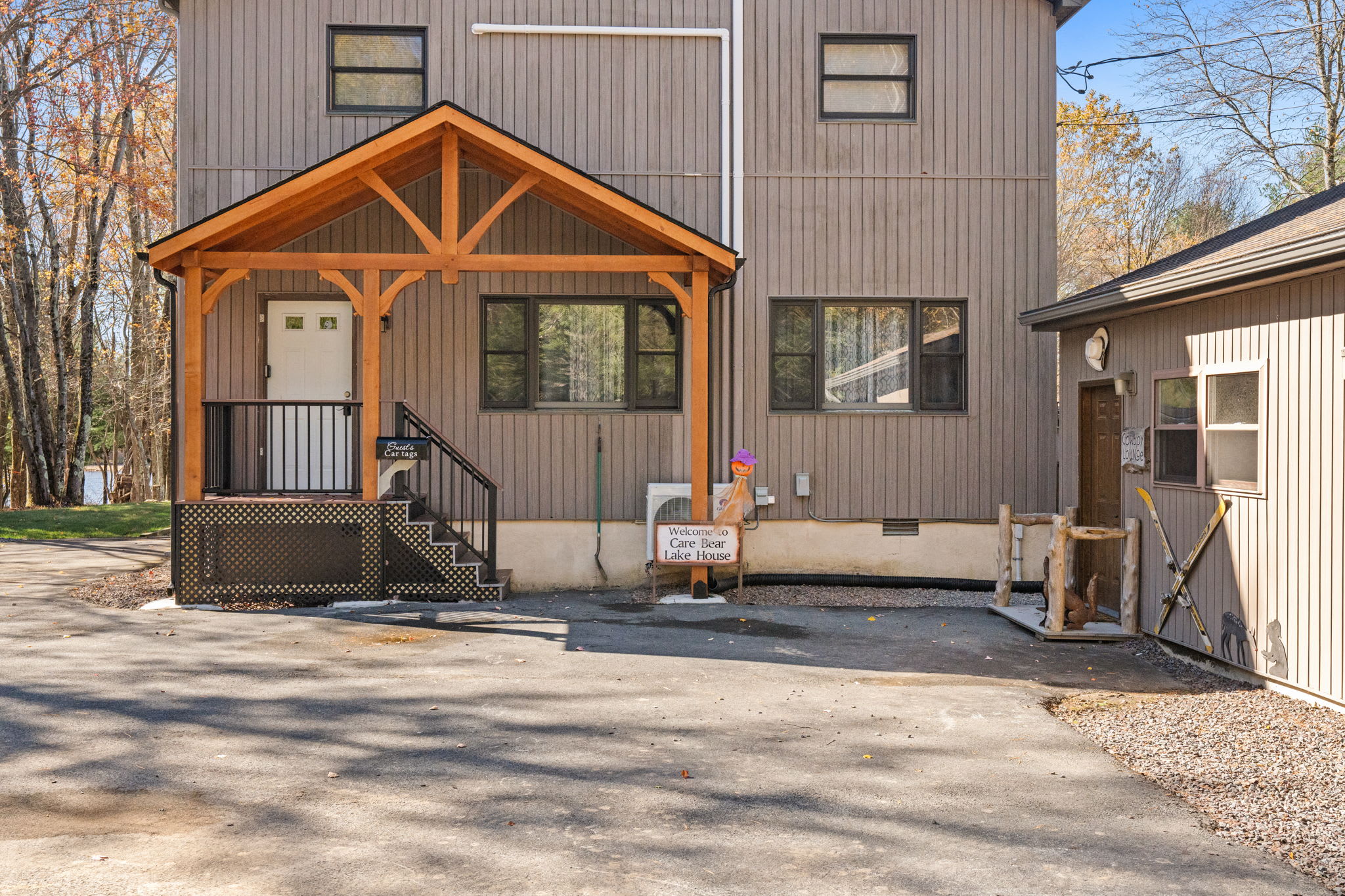 Side exterior with storage shed and garage access - practical amenities for your mountain vacation