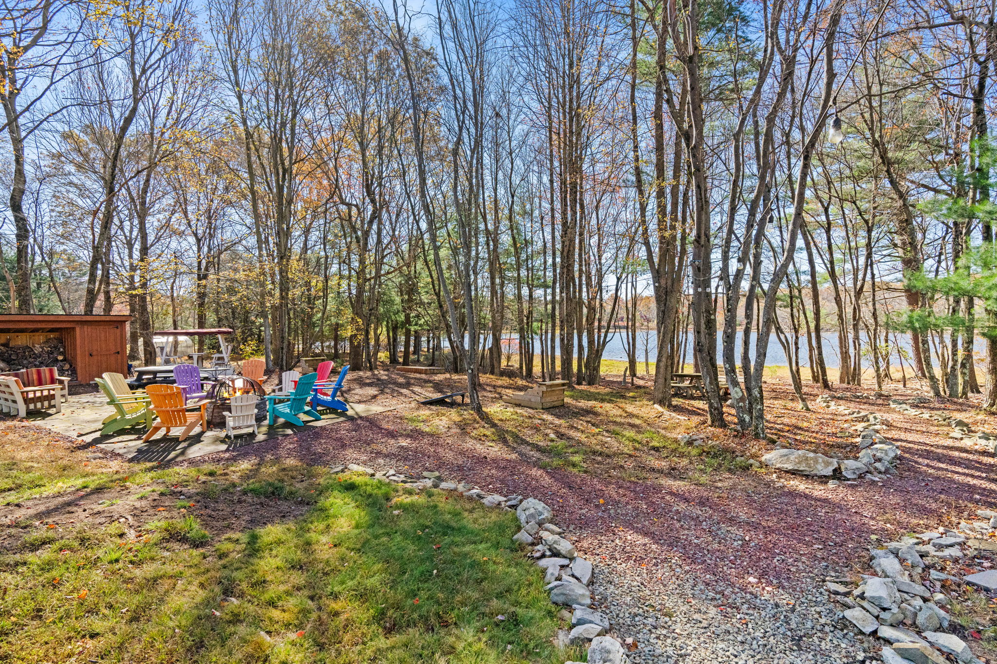 Nature trail winding through the wooded property - explore scenic walking paths on your private grounds