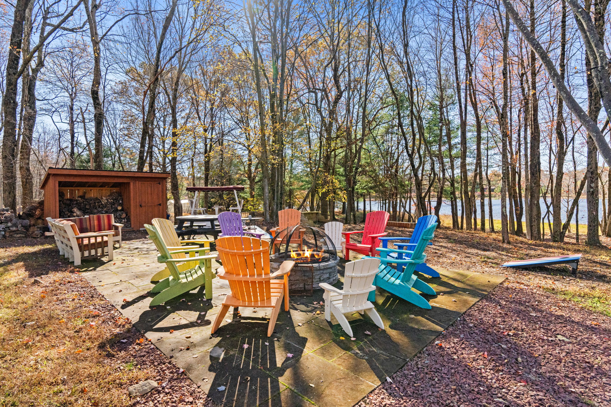 Outdoor dining area with picnic table among the trees - family meals in the fresh mountain air