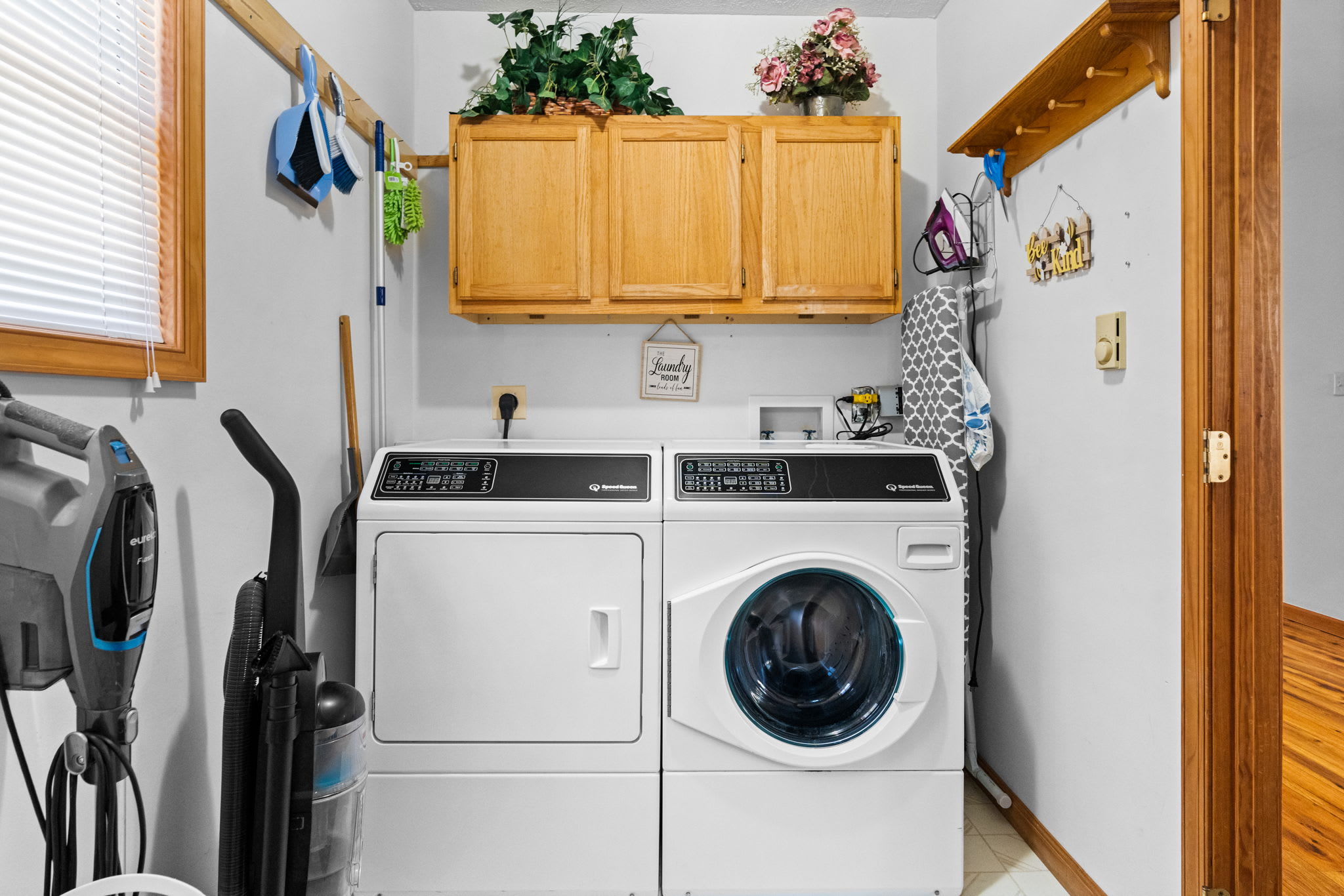 Convenient laundry room with full-size washer and dryer - in-unit laundry for your convenience