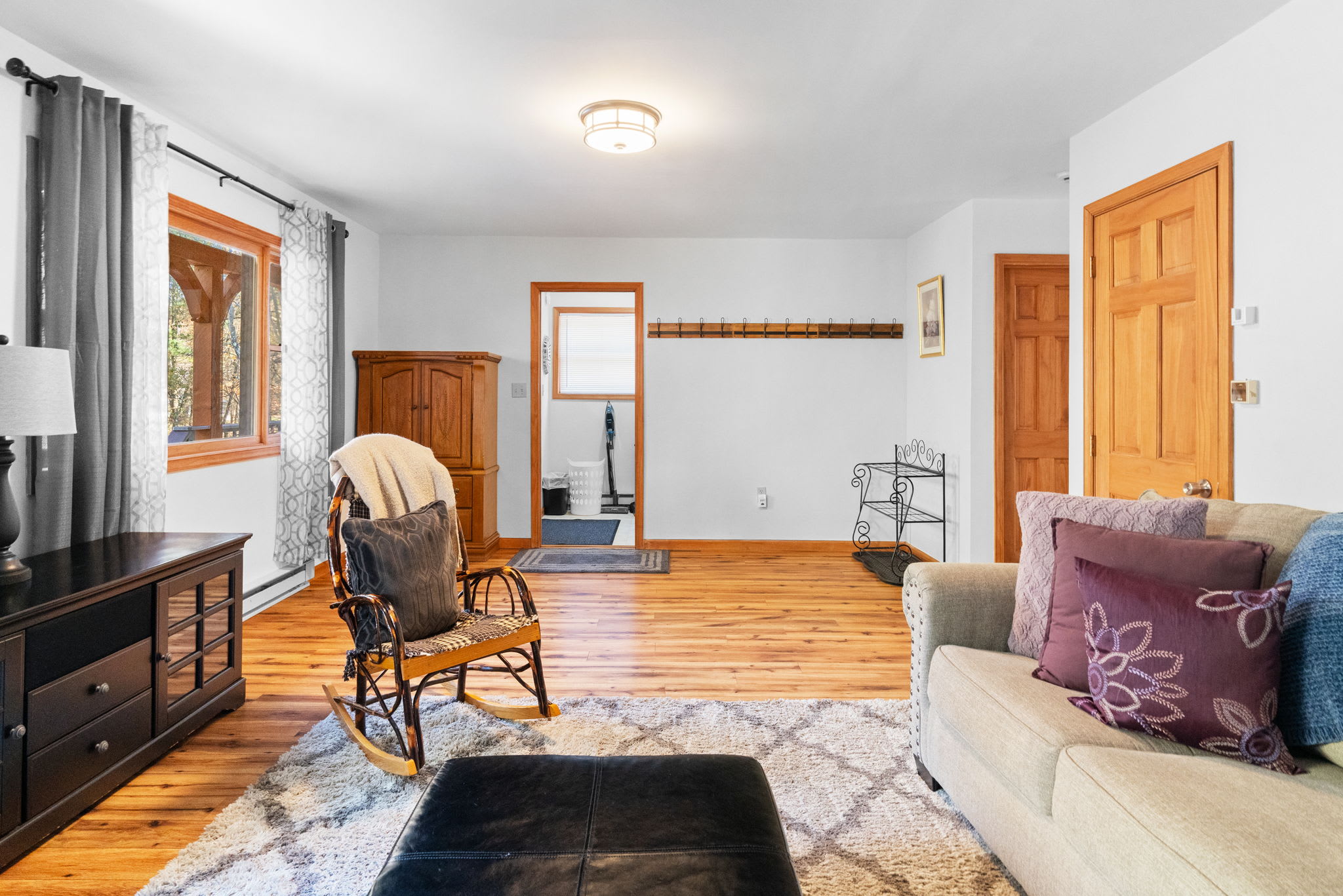 Living room with warm color palette and accent lighting - welcoming space for family time