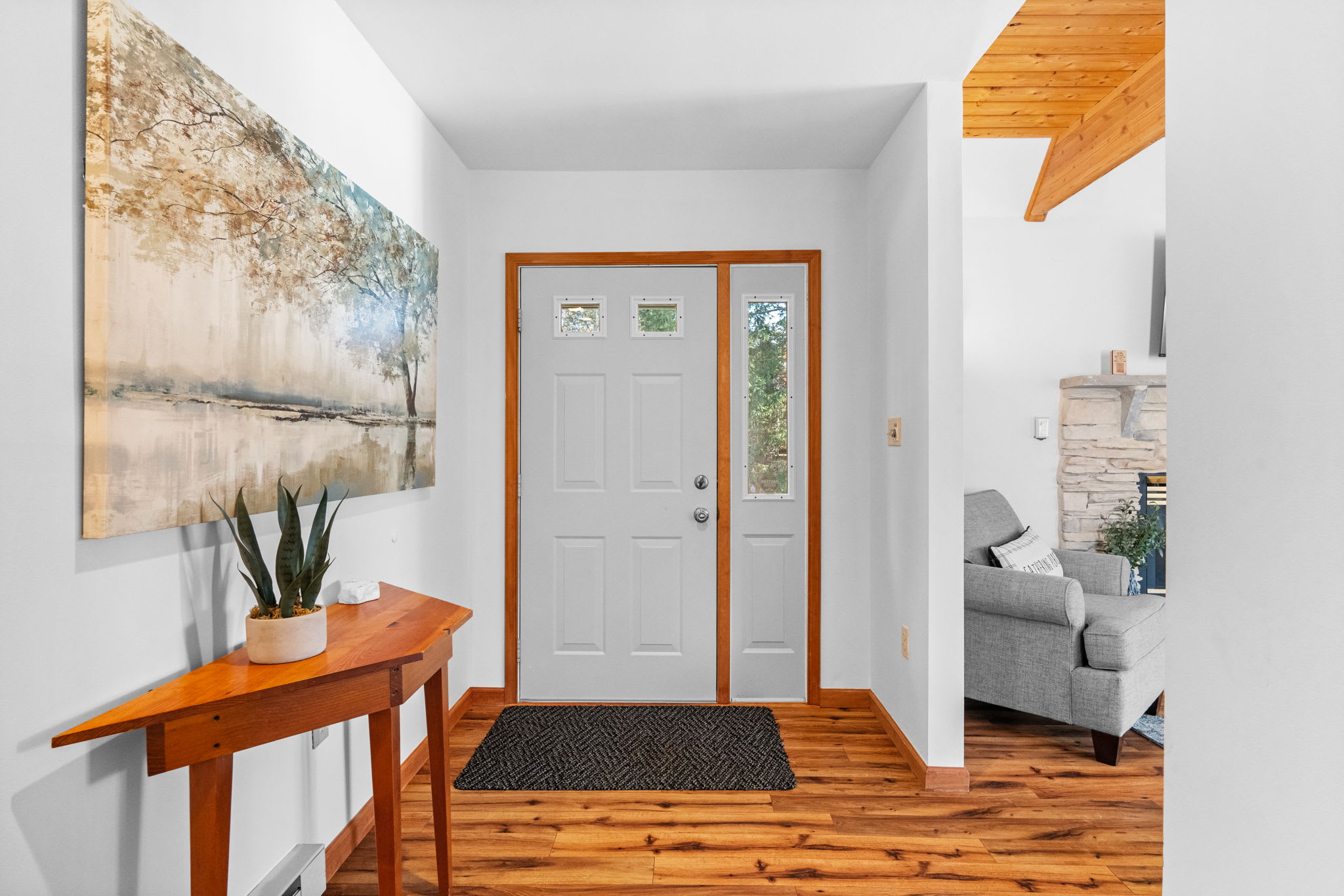 Entryway with dining table and natural light - functional space connecting main living areas