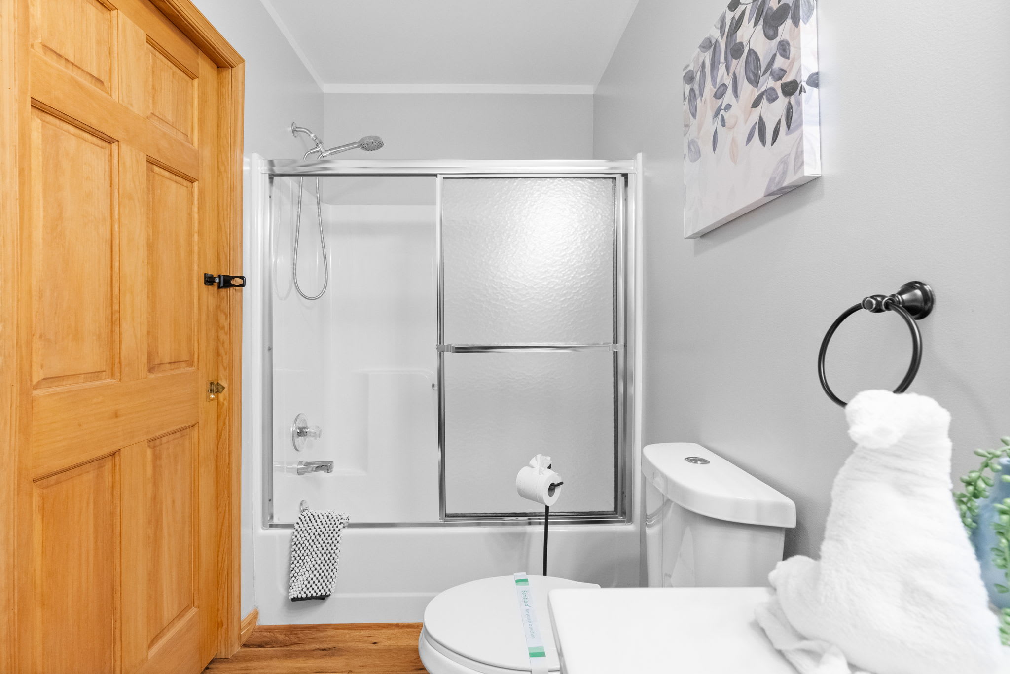 Modern bathroom with clean finishes and fresh towels - well-appointed guest facilities