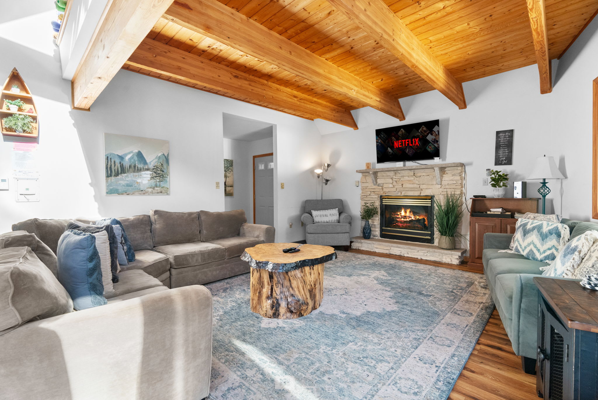 Living and dining area with wood floors - open layout perfect for entertaining guests