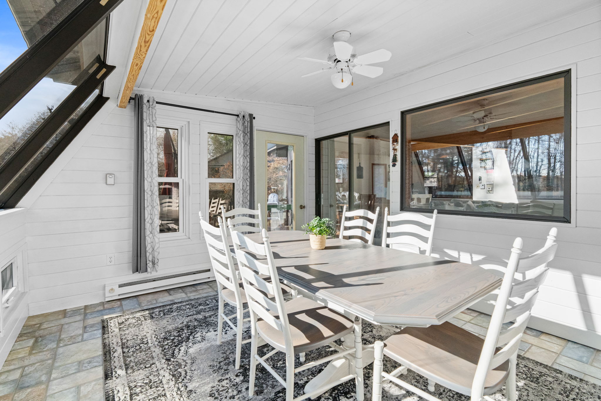 Fully equipped kitchen with breakfast bar and modern appliances - stainless steel amenities for home cooking