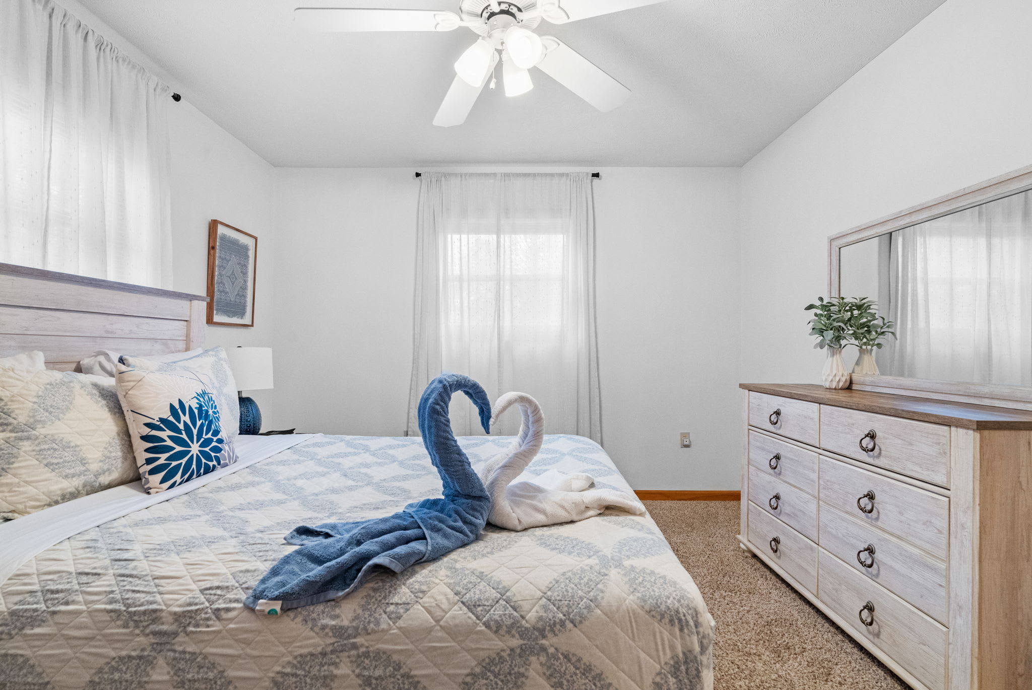 Bedroom with simple furnishings and clean design - comfortable sleeping space for guests