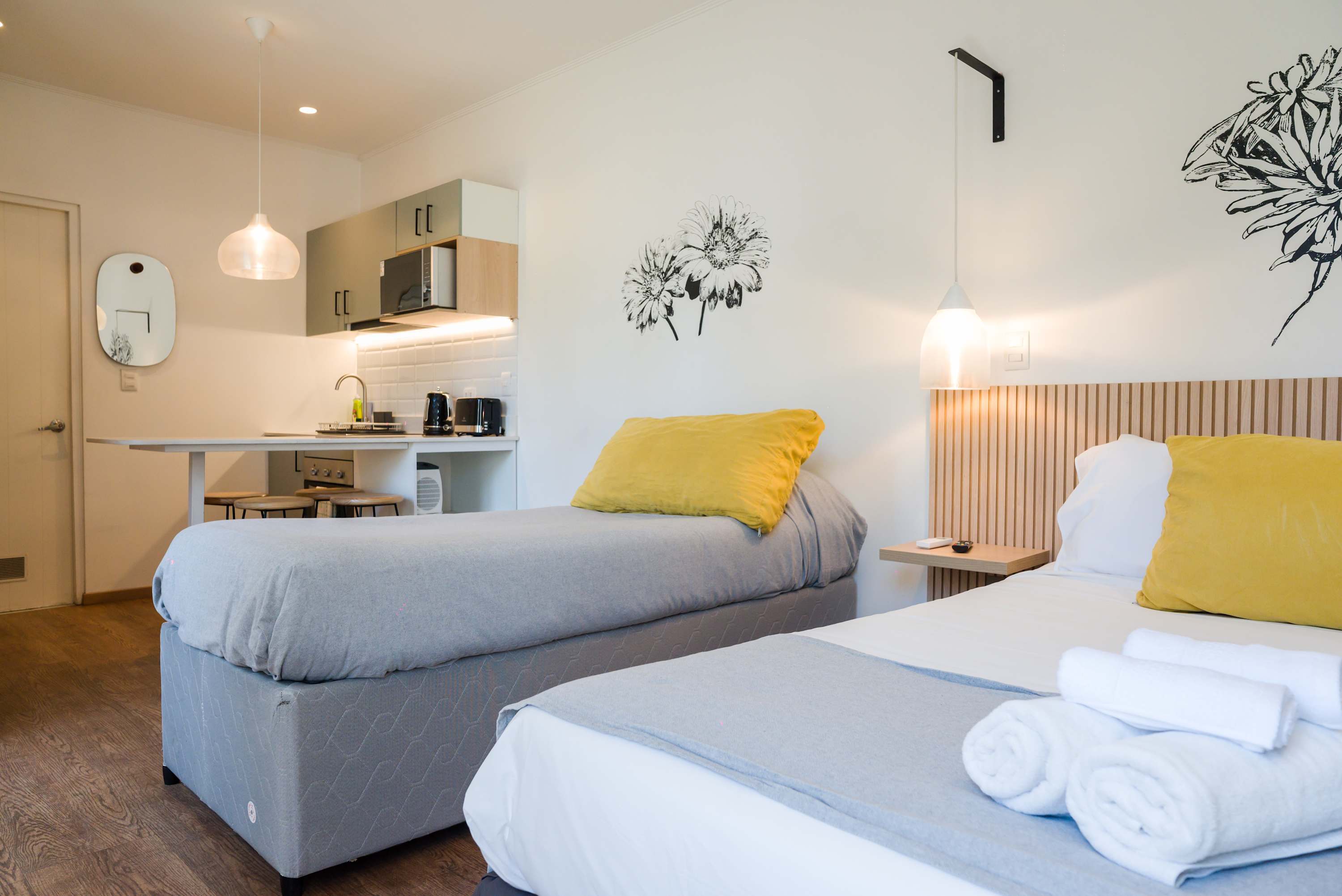 Charming studio with cozy beds and a fully equipped kitchenette, perfect for a comfortable stay in the heart of the city.