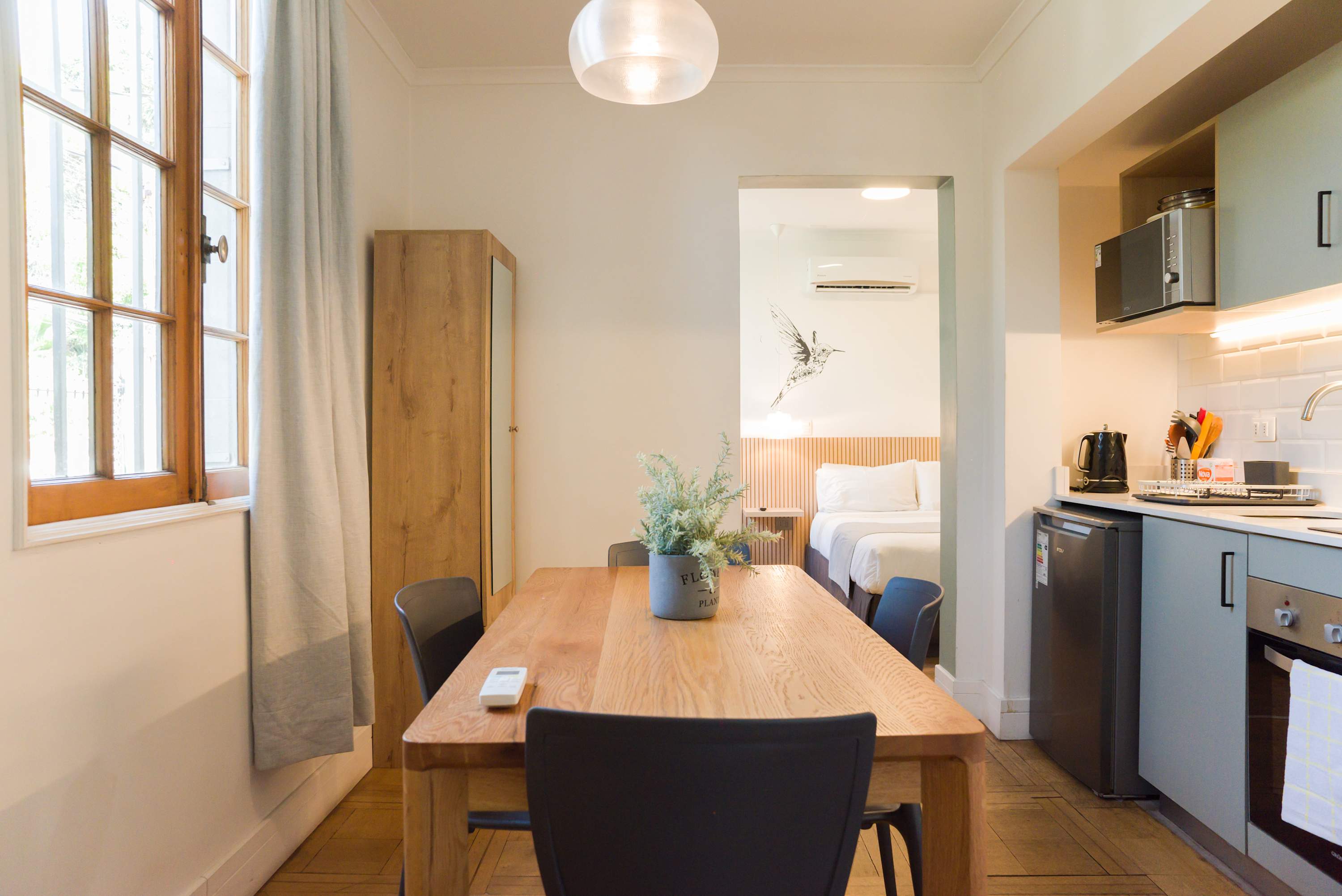 Charming studio with a cozy dining area and modern kitchen, perfect for a relaxing stay in the heart of Chile.