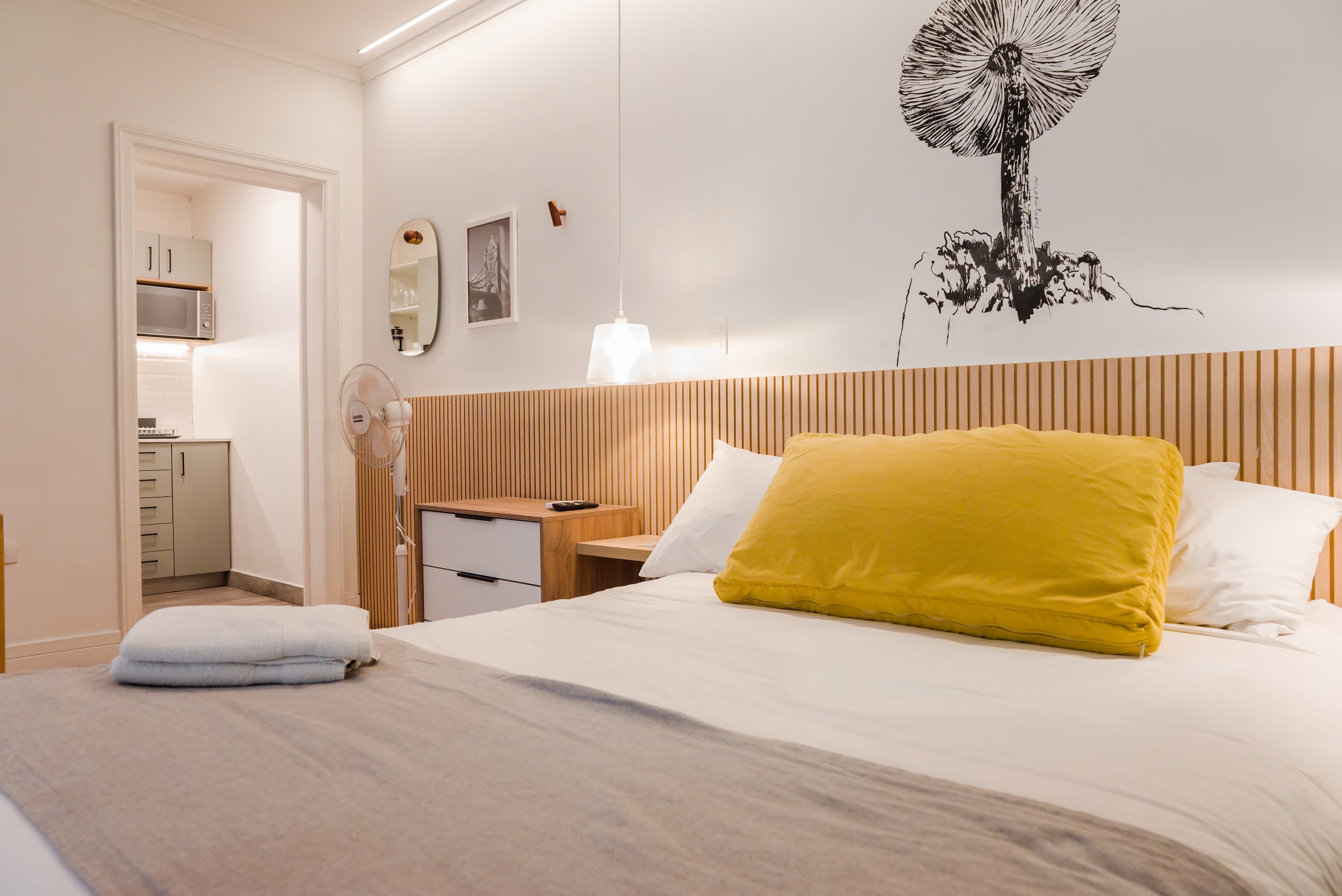 Relax in this stylish studio with a cozy bed and modern kitchen, perfect for a comfortable stay in the heart of Chile.