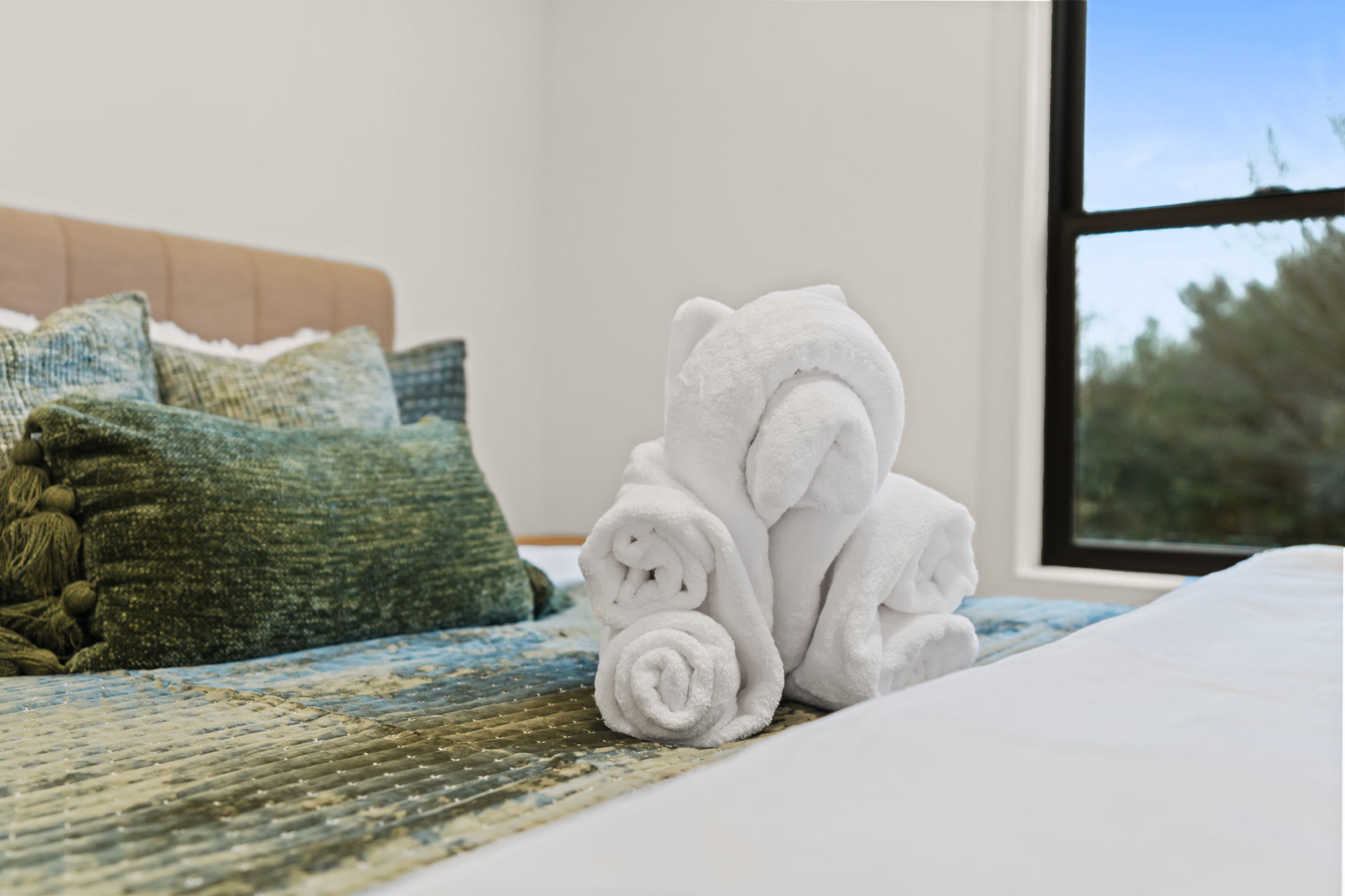 Sweet towel art welcomes you to your cozy retreat