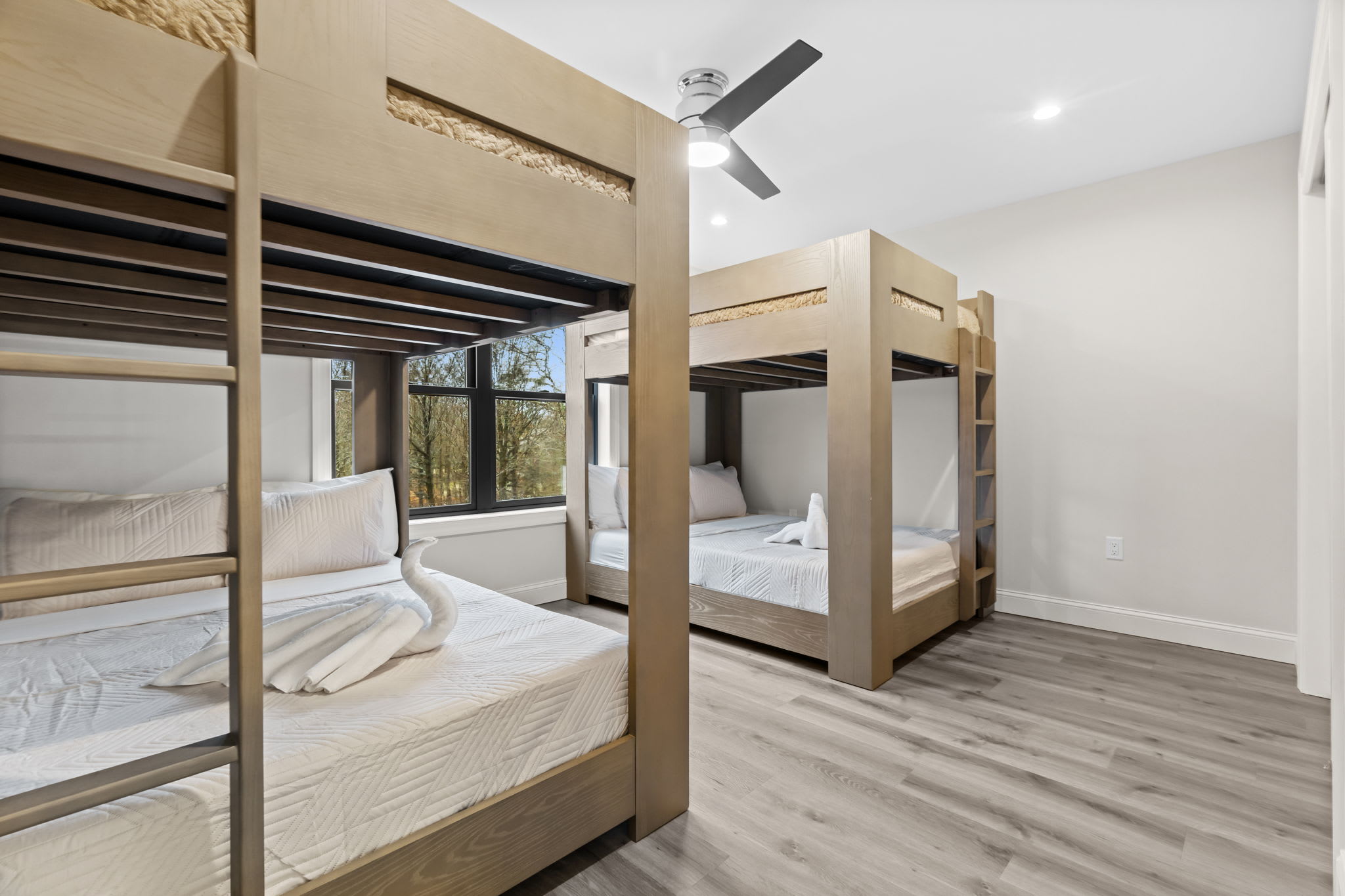 Climb into the cozy built-in bunk beds for a restful night among the trees