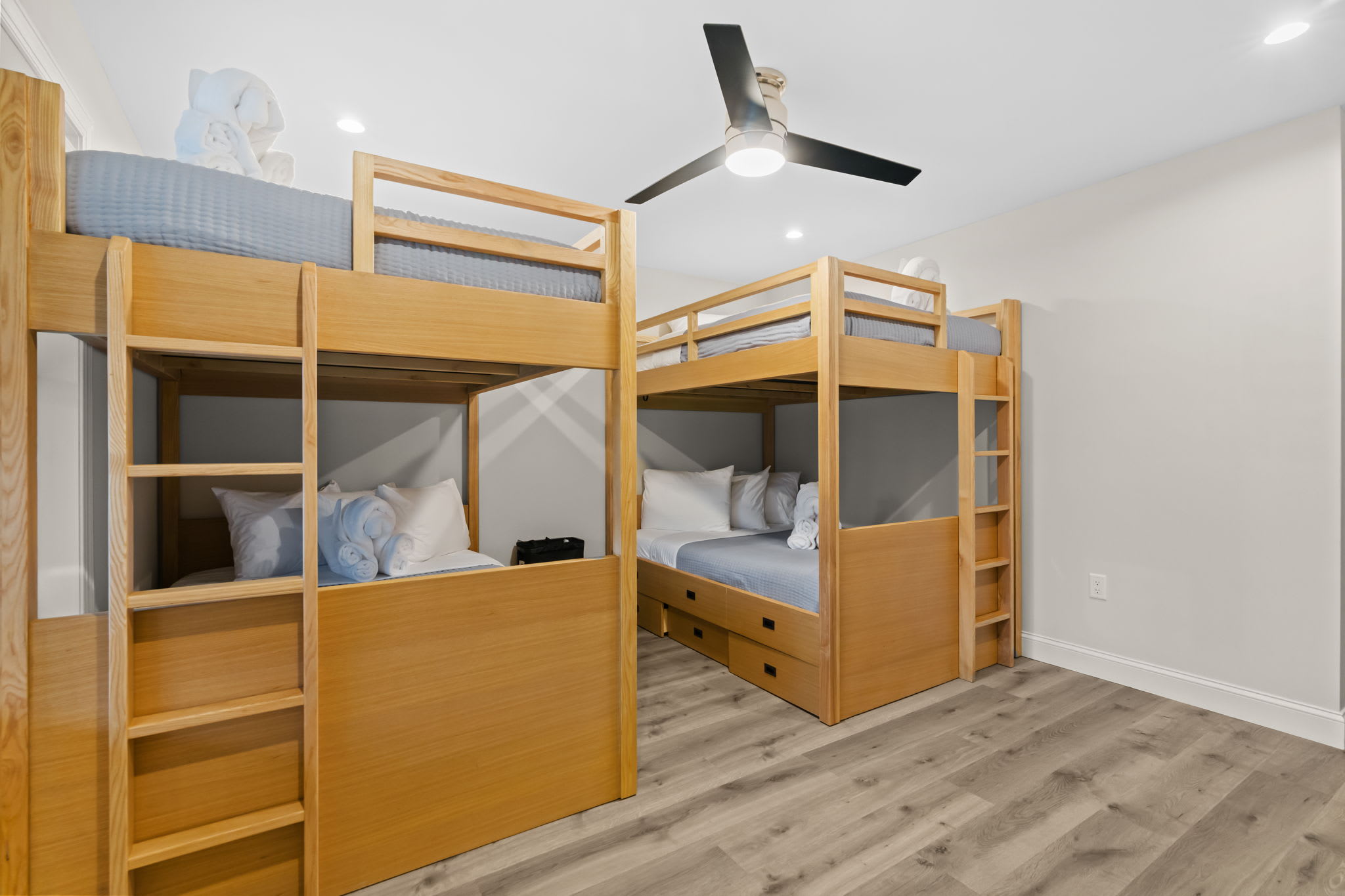 Built-in bunk beds in the fun-filled kids room with forest views