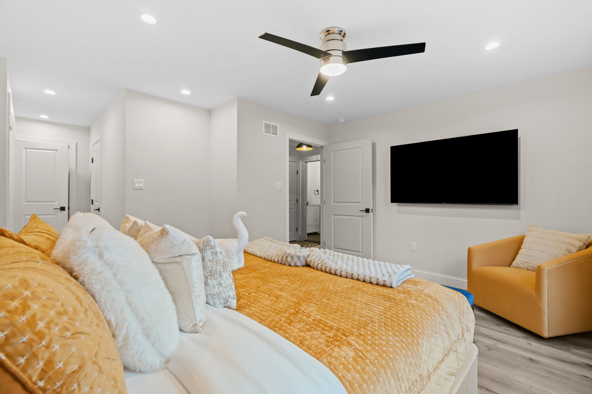 Stretch out on the comfy queen bed with a cozy sitting area nearby