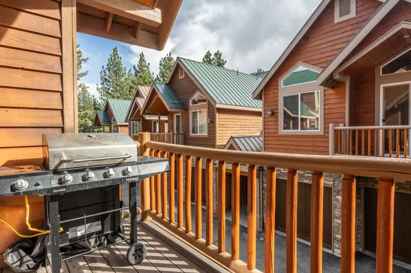 Relax on the balcony featuring a Char-Broil gas BBQ grill
