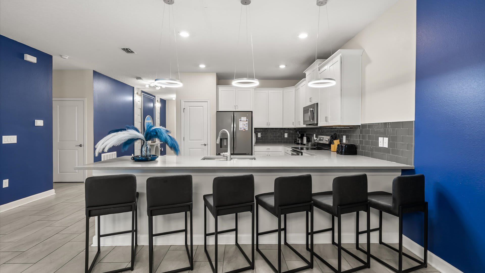 Modern family kitchen with breakfast bar seating