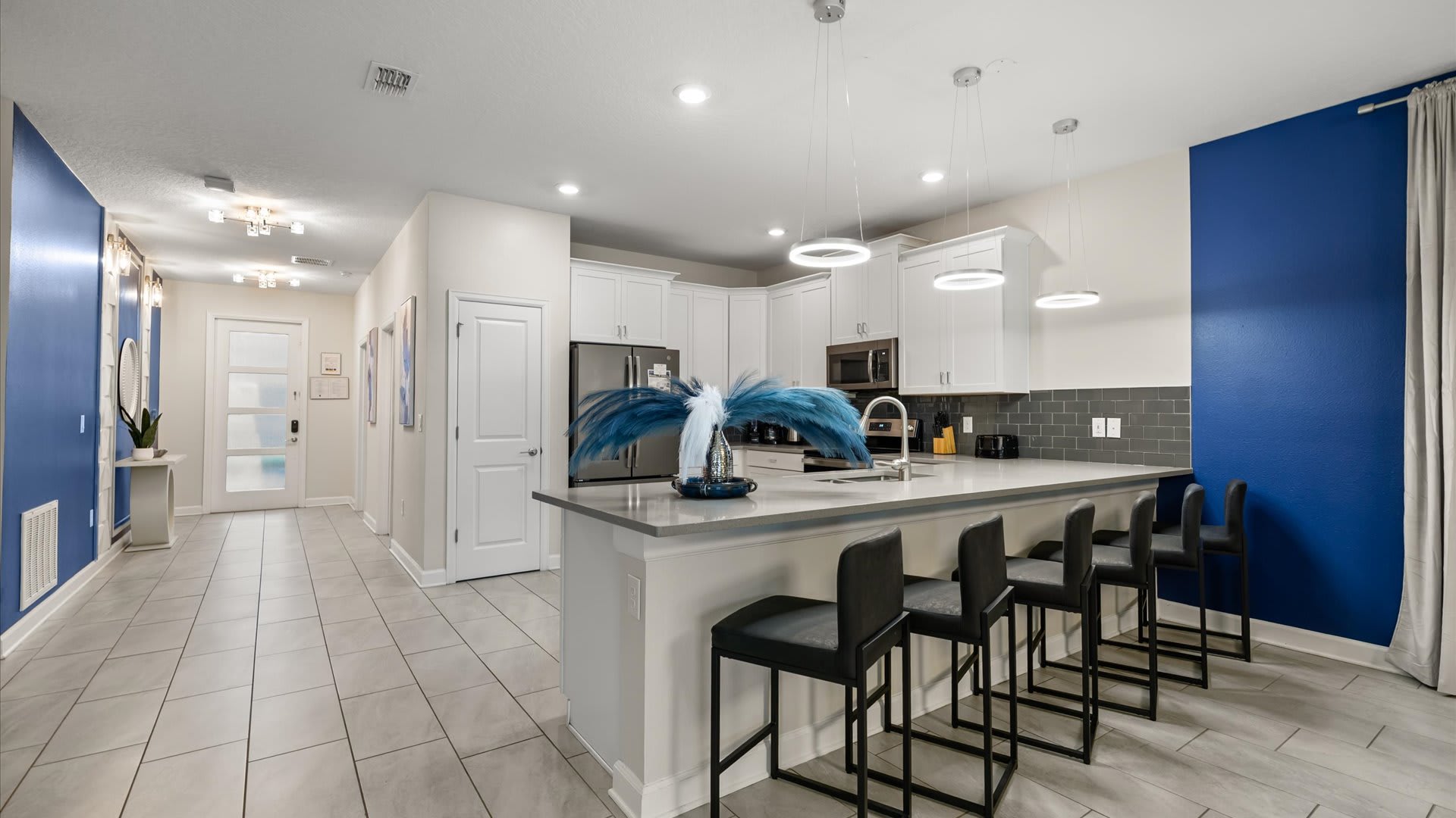 Modern family kitchen with breakfast bar seating