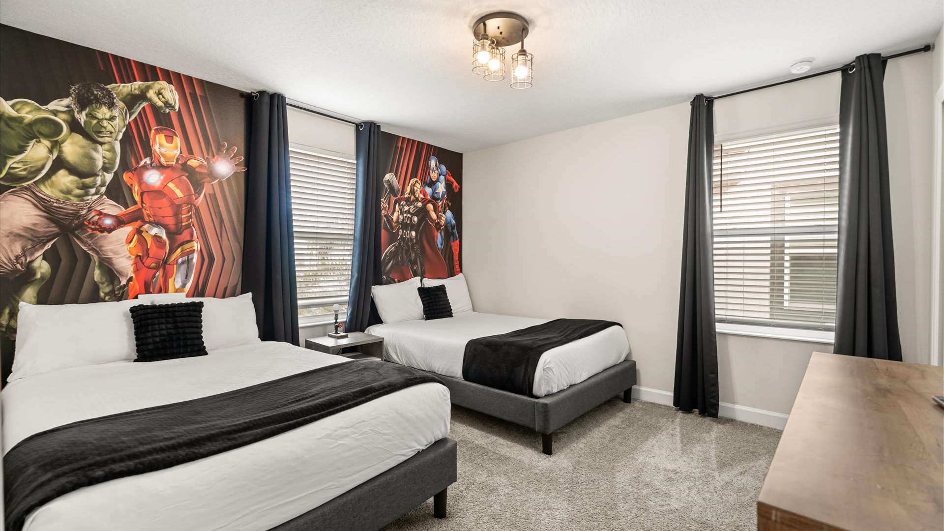The Avengers themed bedroom with 2 double beds and smart TV 