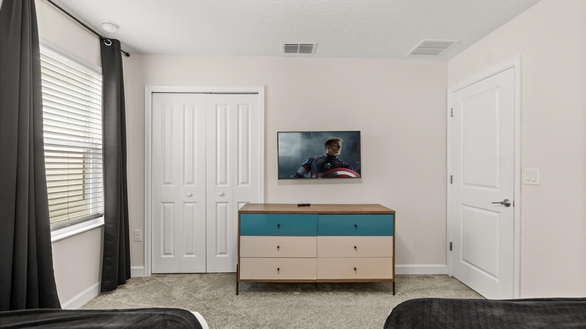 The Avengers themed bedroom with 2 double beds and smart TV 