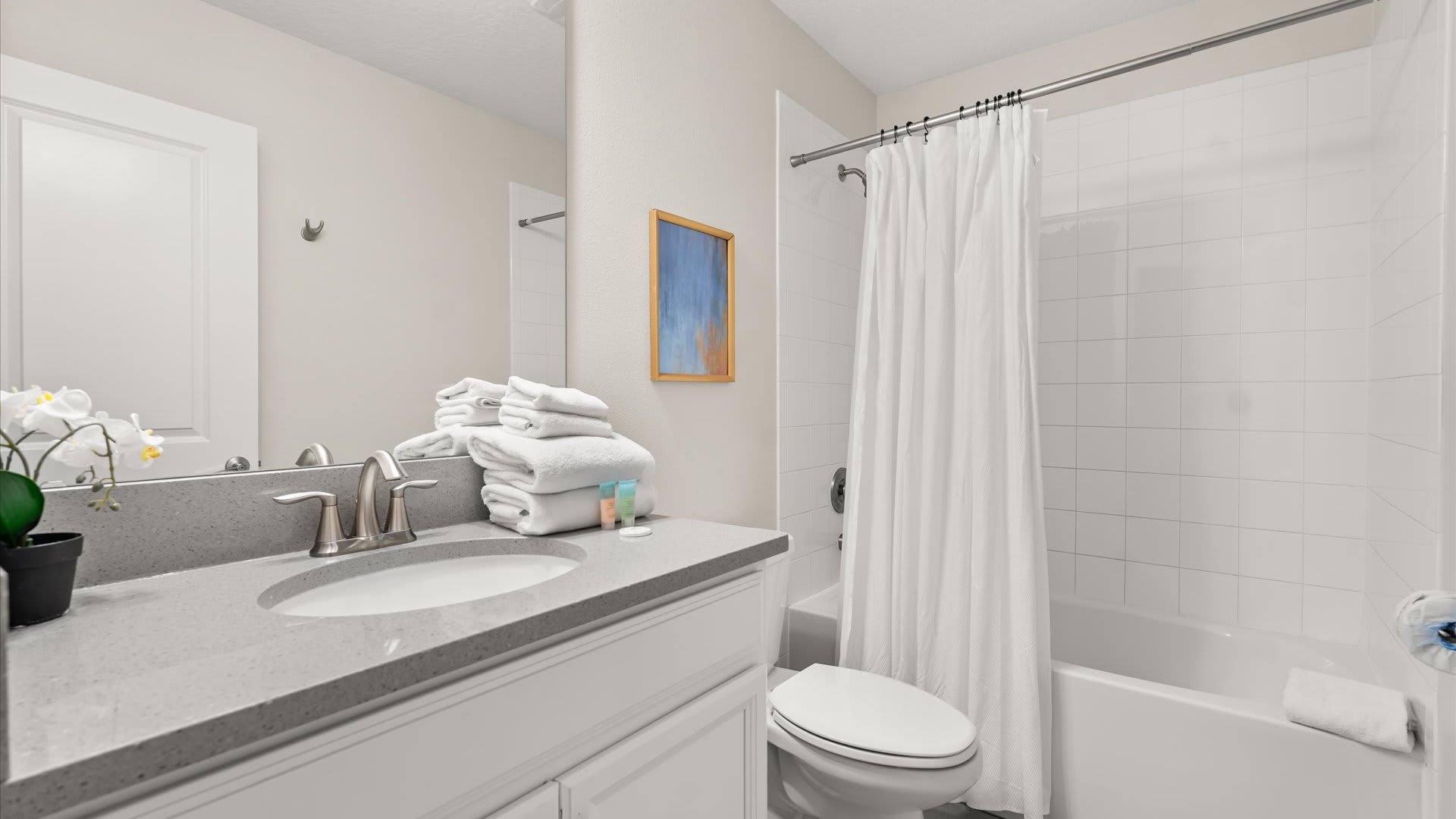 En-suite bathroom with shower and tub combo