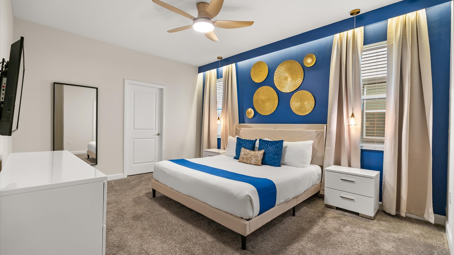 Vibrant King bedroom with smart TV and en-suite bathroom 