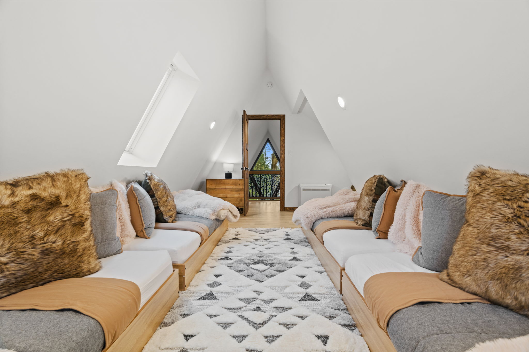 Spacious loft retreat with twin sleeping nooks and skylight for stargazing