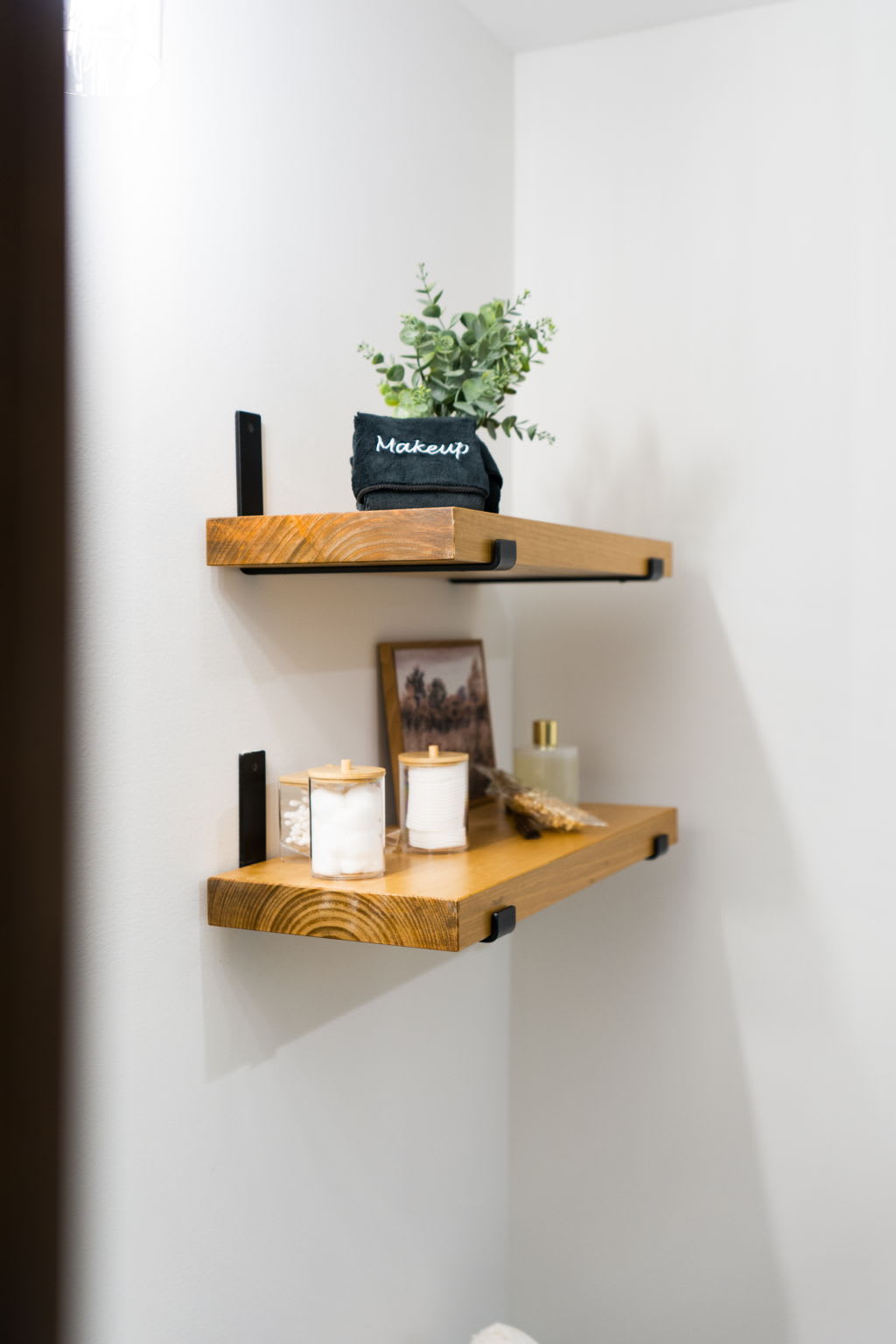 Clean lines and natural wood tones create a refreshing bathroom retreat
