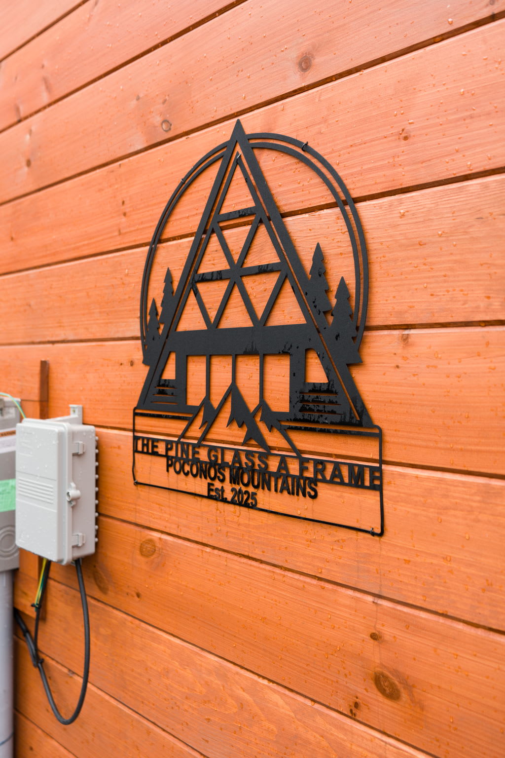 Custom cabin sign welcomes you to your Poconos mountain escape