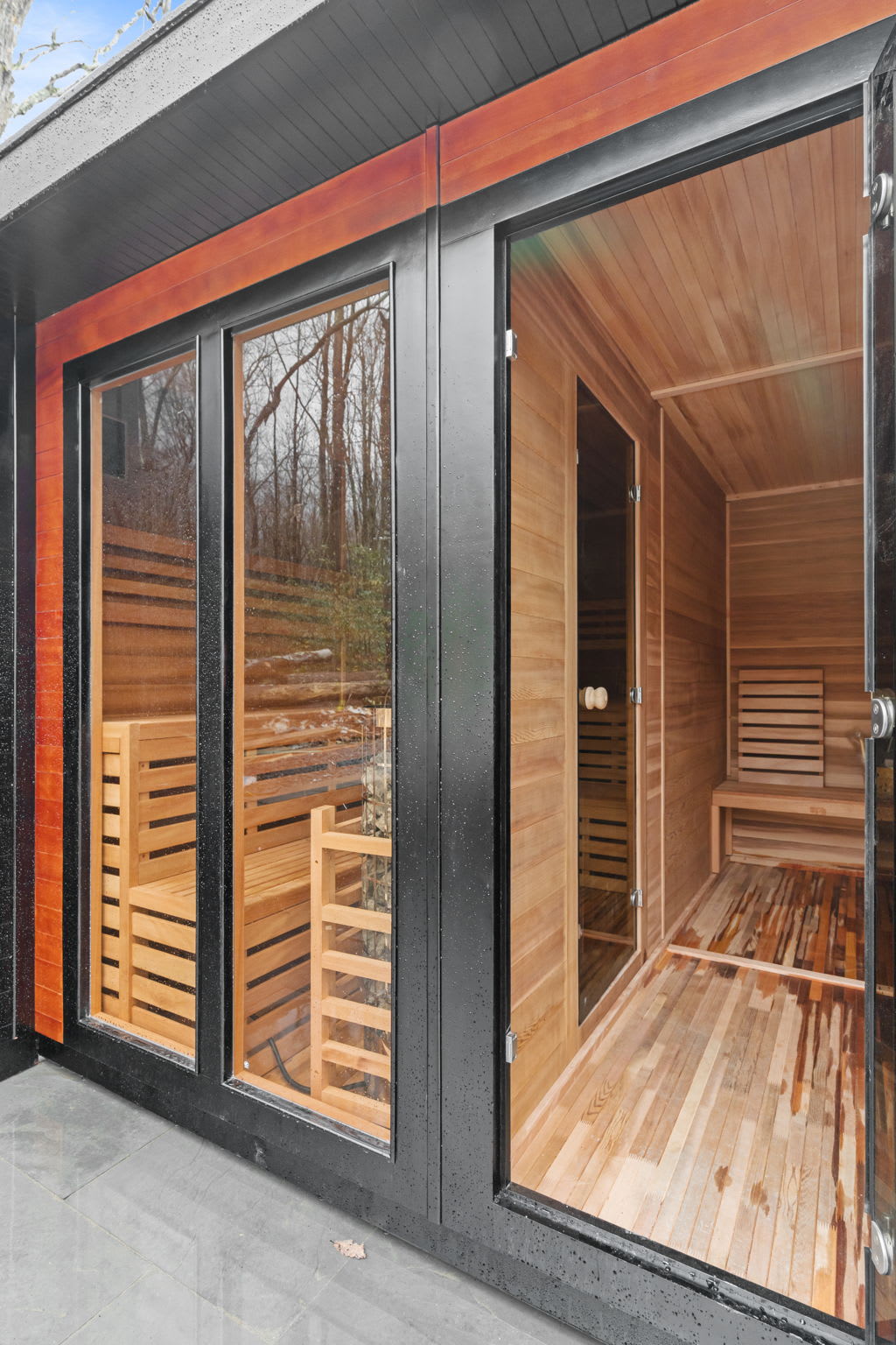 Warm up in the cedar barrel sauna with glass door overlooking the forest