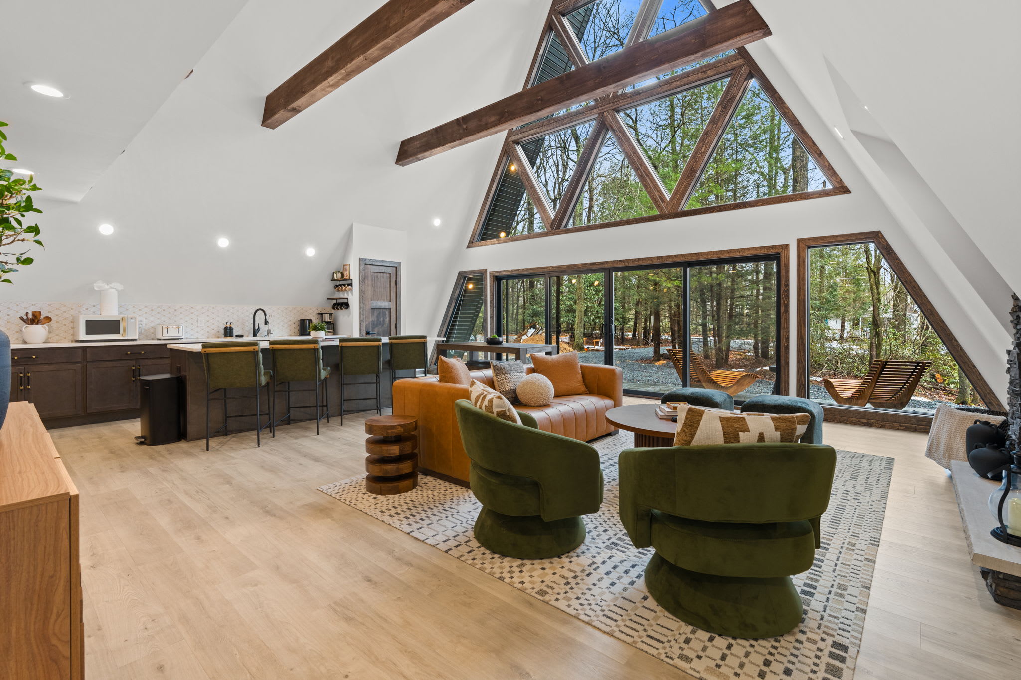 Gaze down from the loft onto the sun-filled living and dining spaces.