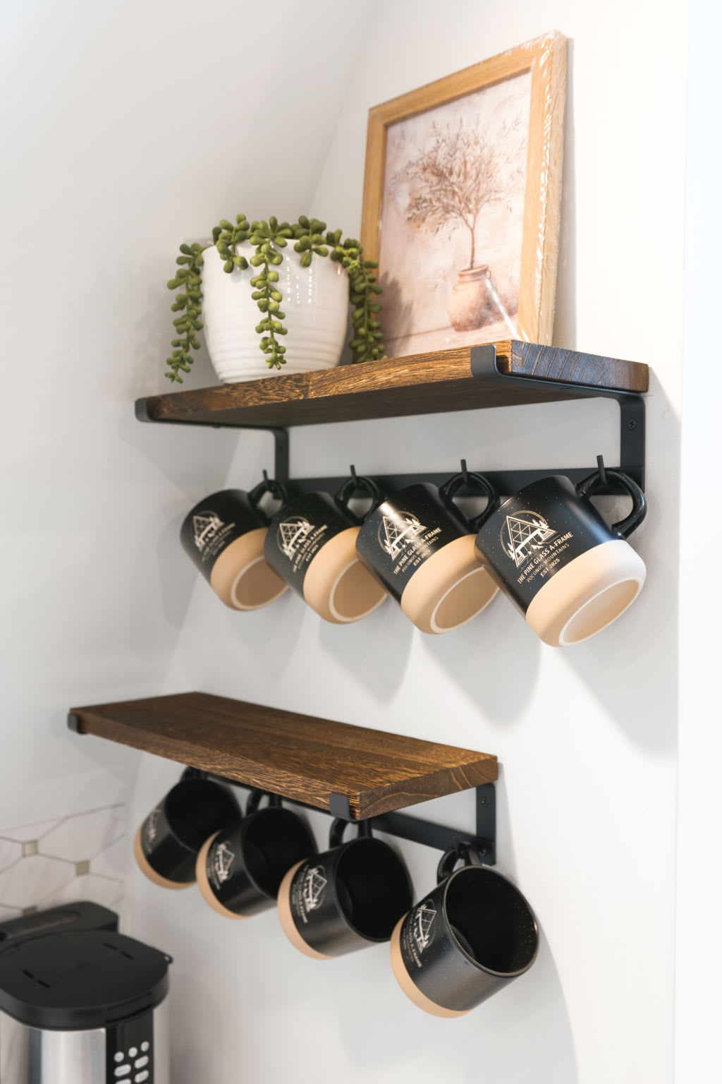 Brew your morning coffee with branded cabin mugs at the cozy coffee station