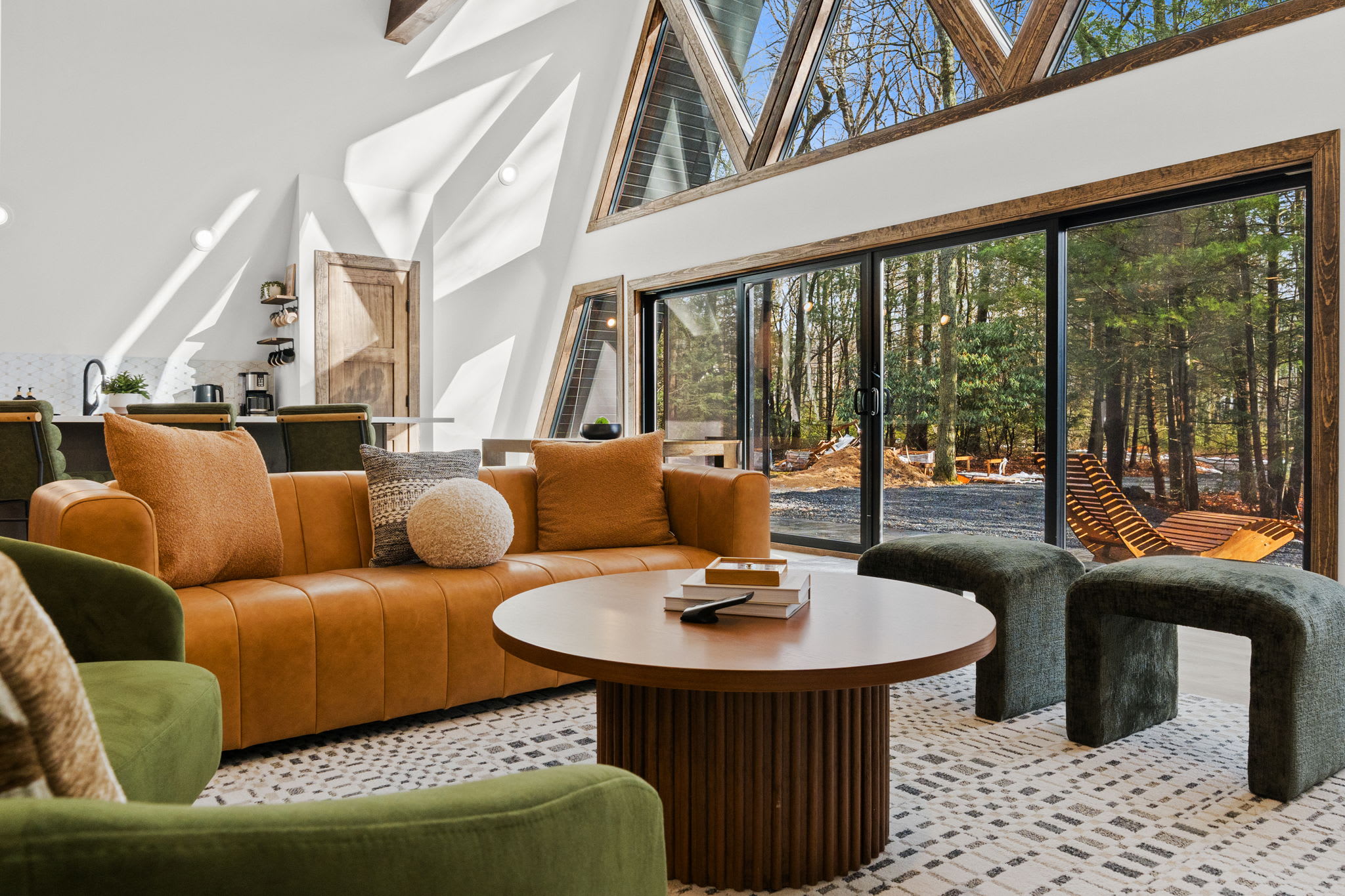 Settle into the warm leather seating area and soak in the forest views.