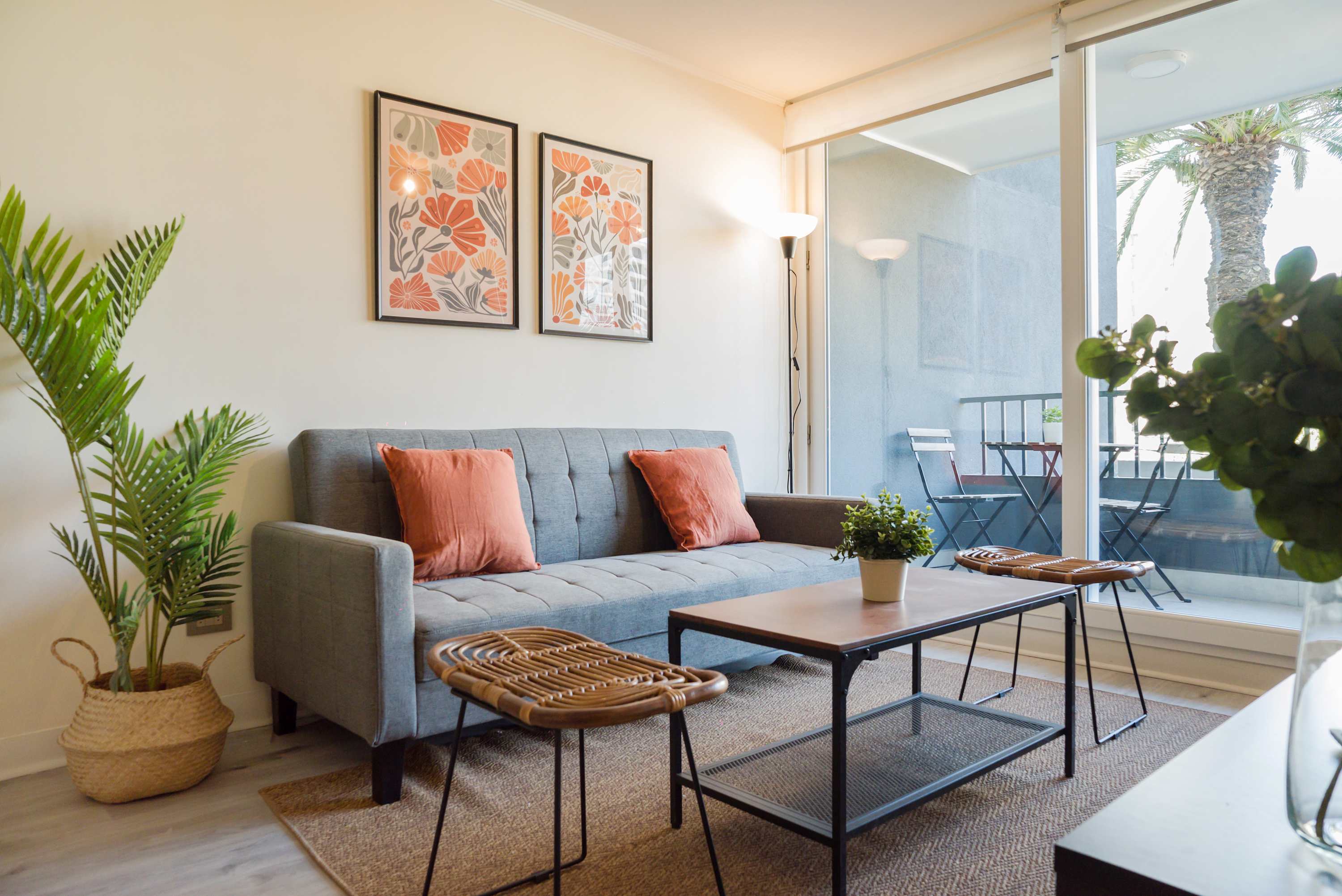 Bright and stylish living room with balcony access, perfect for unwinding after a day of exploring.