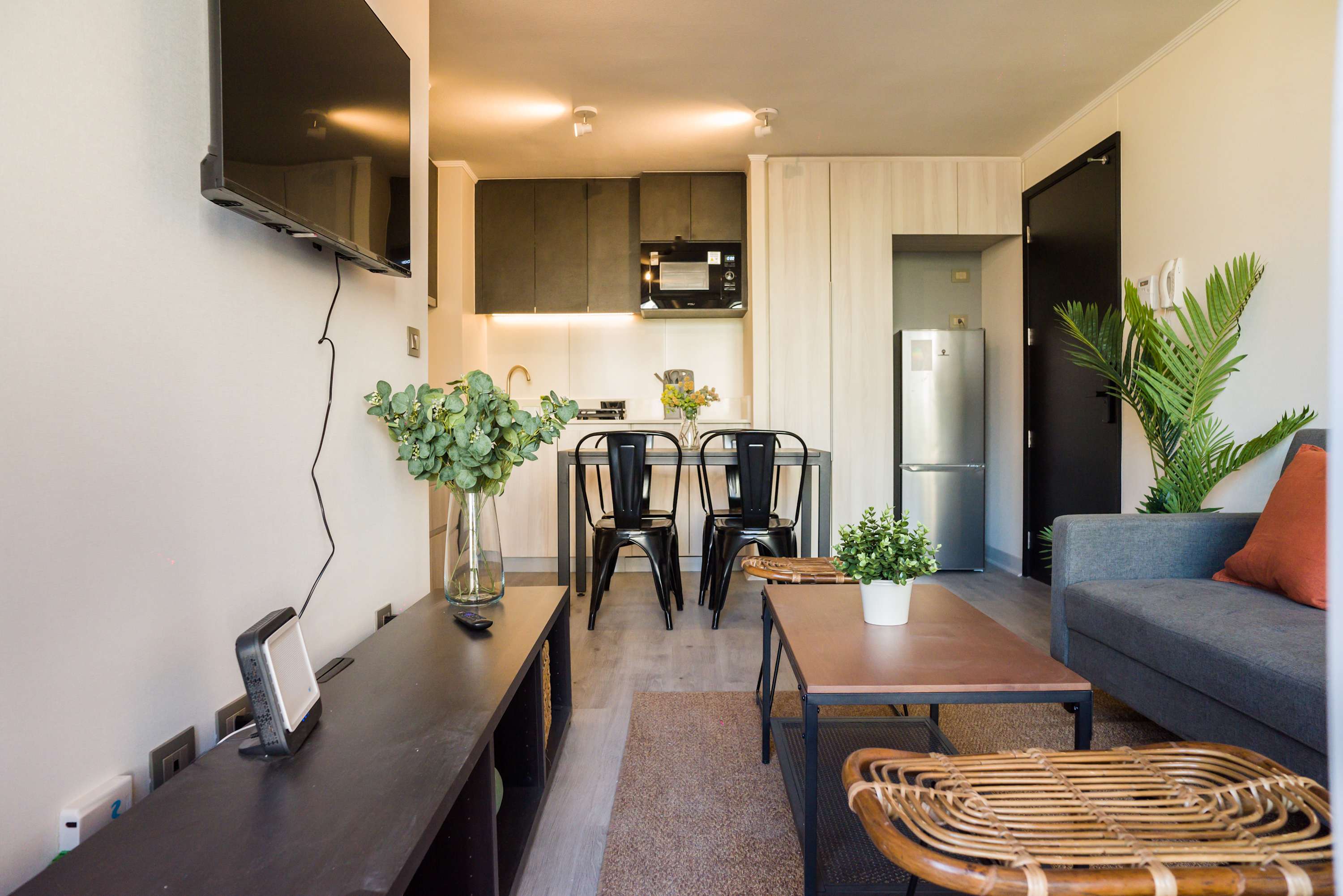 Stylish living space with modern amenities, perfect for unwinding after a day of city exploration.