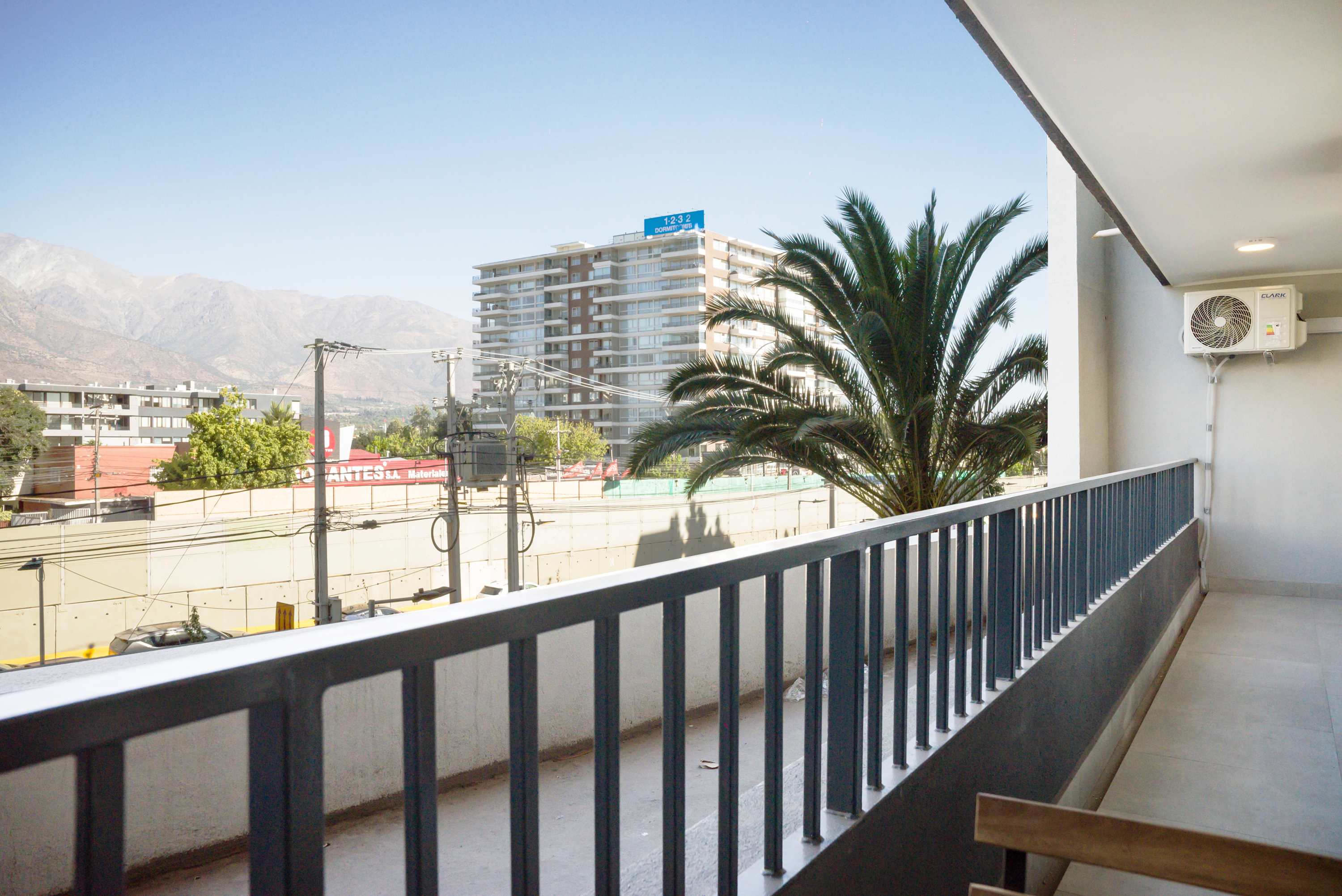 Relax on your private balcony with breathtaking mountain views, perfect for unwinding after a day of exploring.