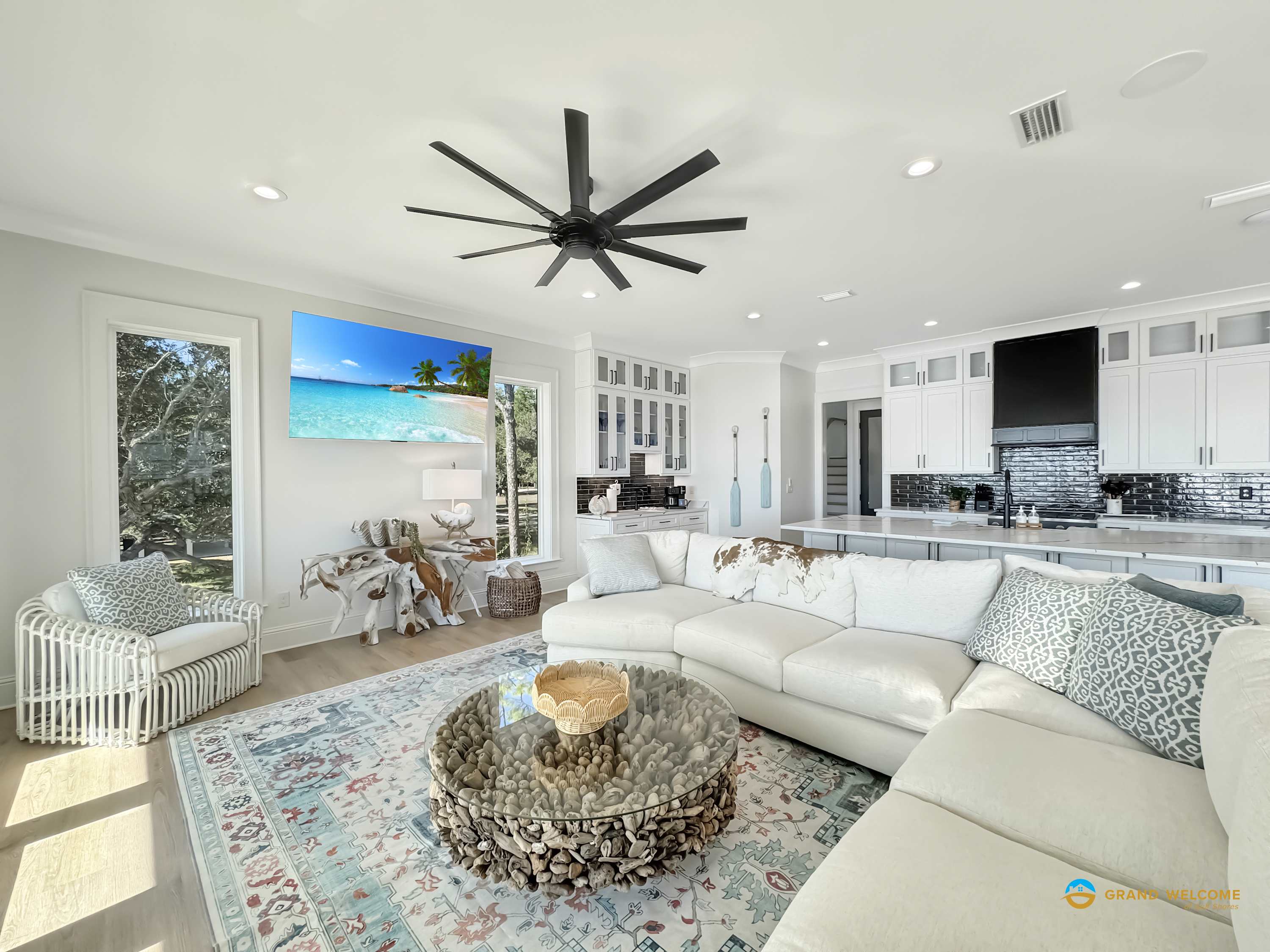 Comfortable living room featuring smart TV and scenic water views