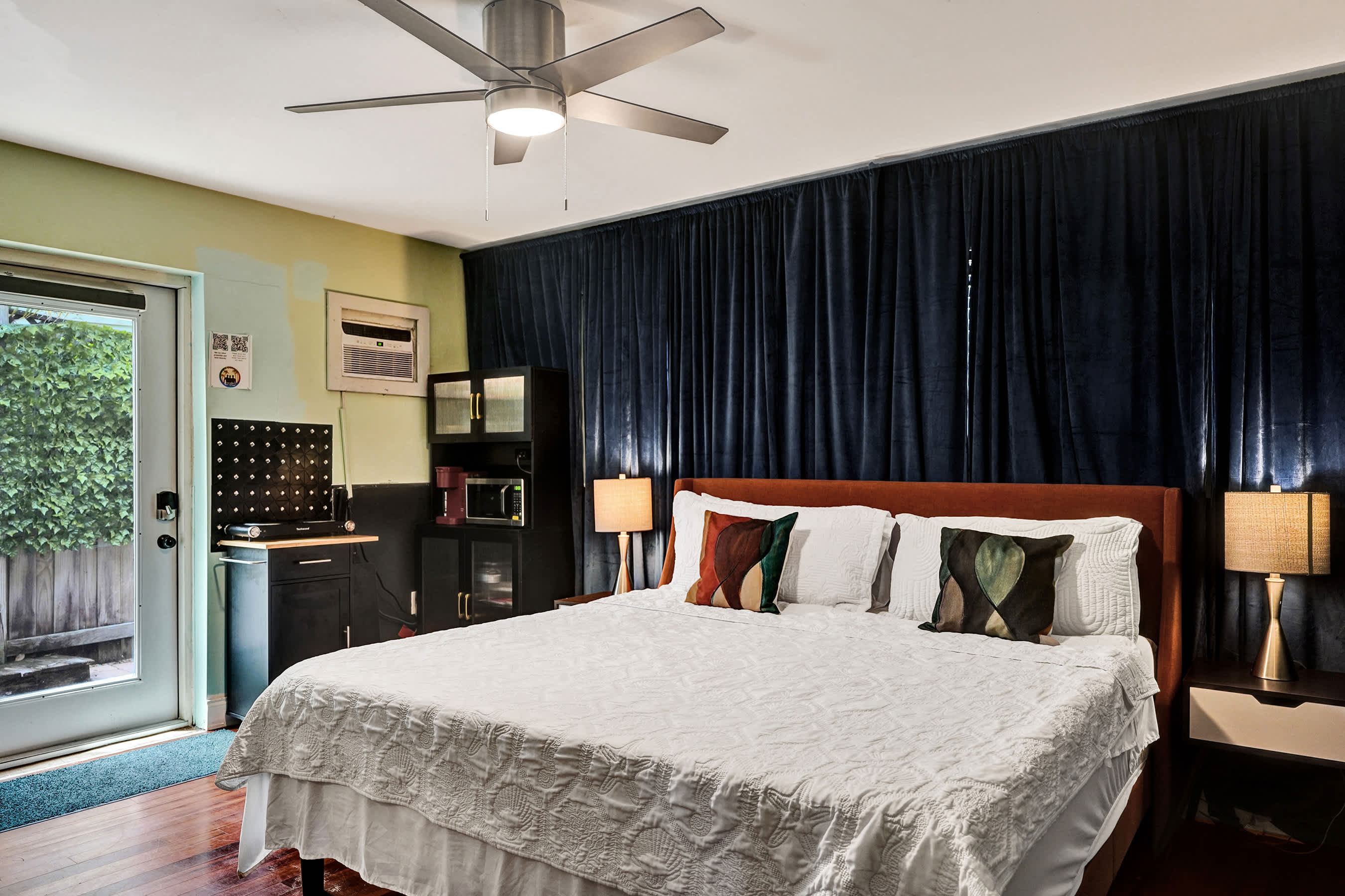 Unwind with your favorite streaming entertainment on Unit 2’s plush king
bed​​