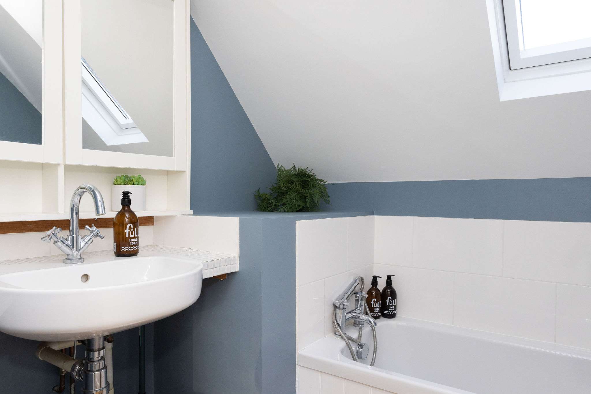 Bright, practical and well laid out bathroom