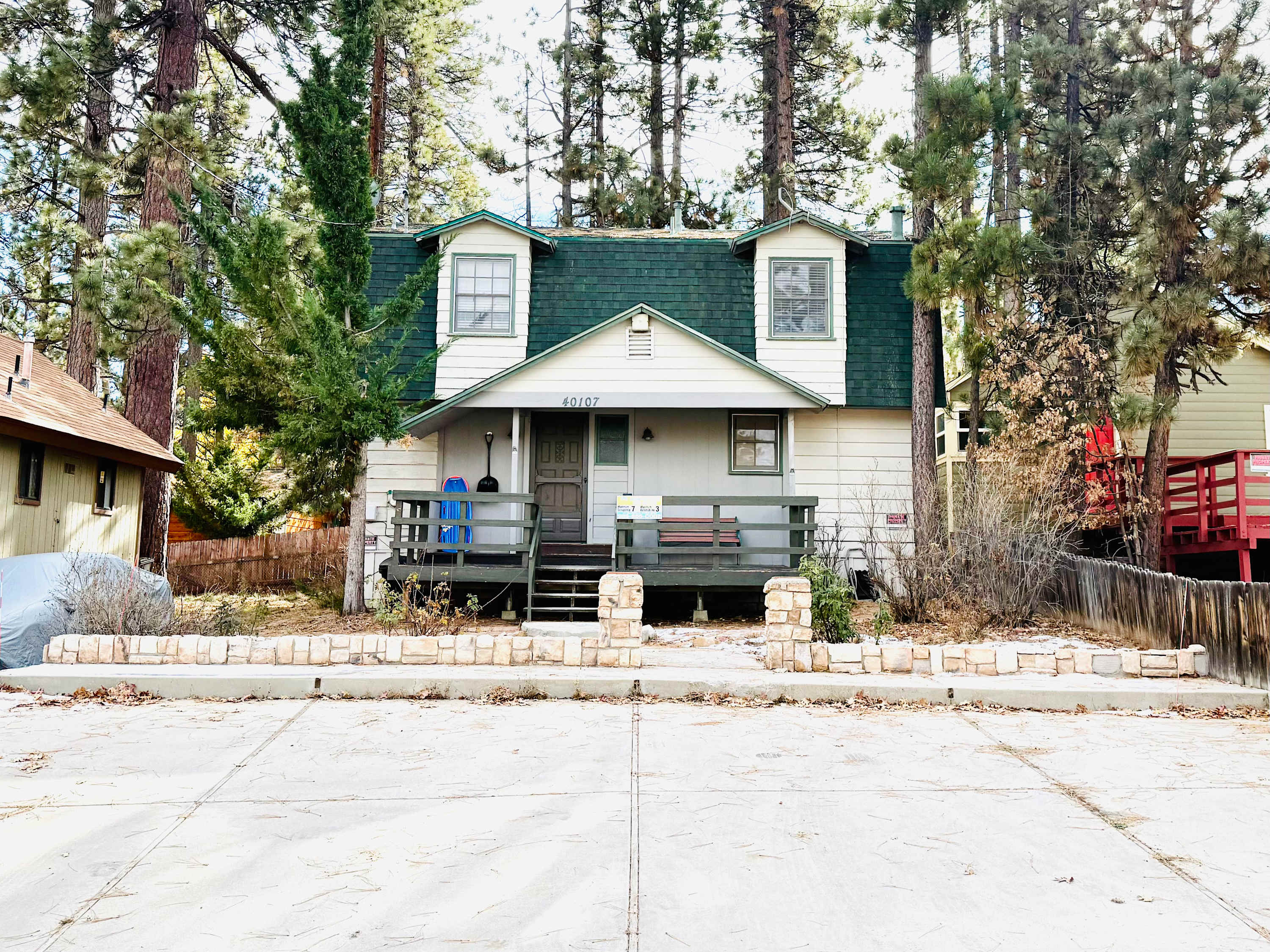 Front of house, porch and parking for 2 vehicles.