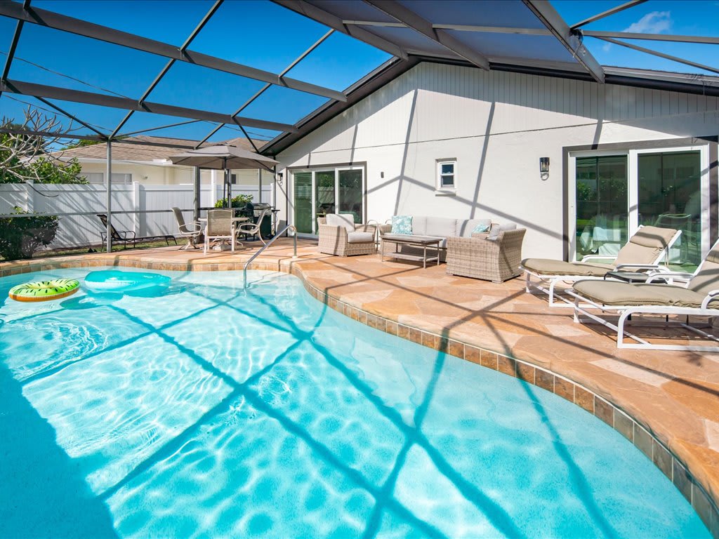 Walk to Beach Family Pool Home in Naples | Photo 25