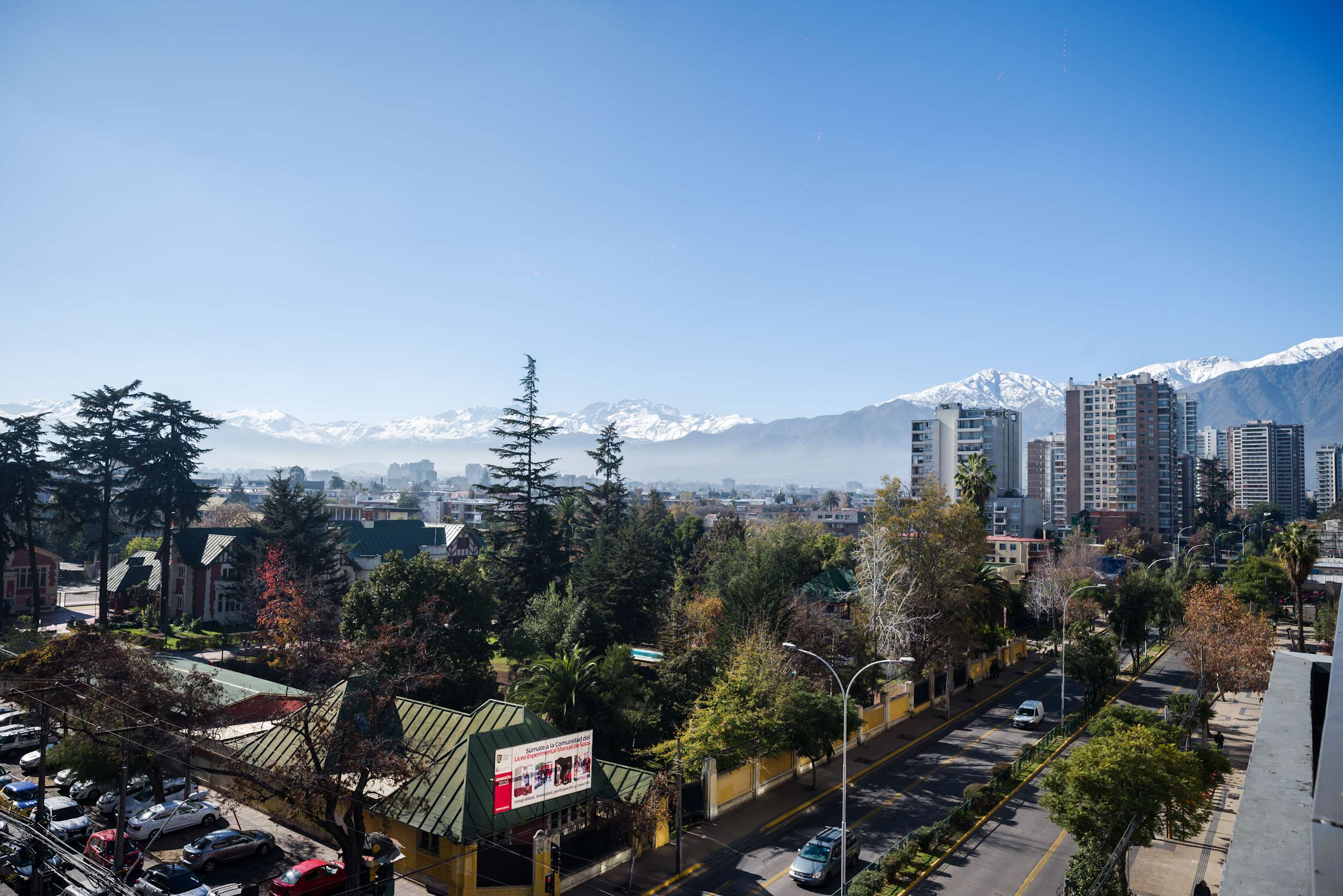 Enjoy breathtaking views of the Andes and vibrant cityscape from your serene Chilean getaway.